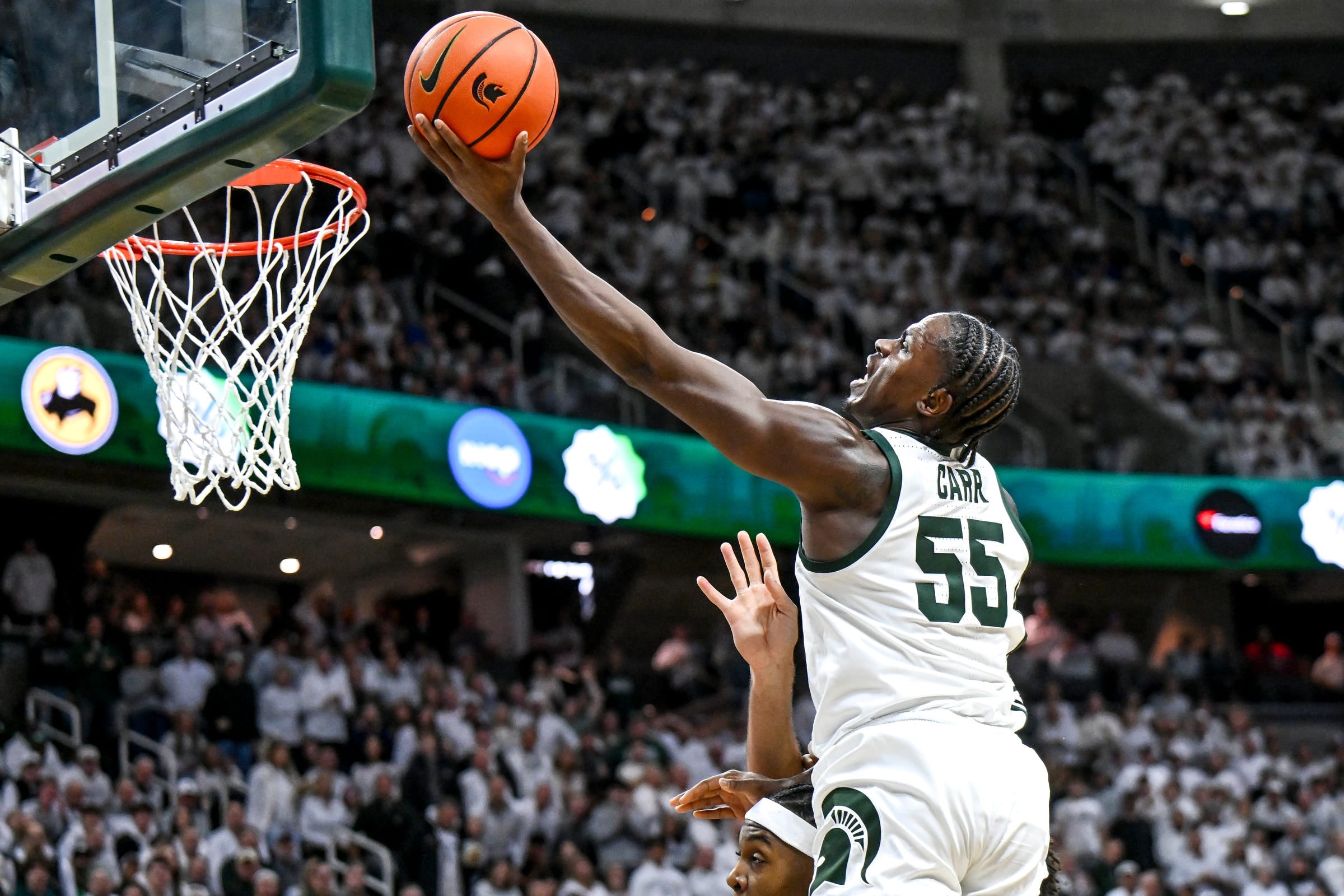 Michigan State's Coen Carr scores against Duke during the first half on Saturday, Dec. 6, 2025, at the Breslin Center in East Lansing.