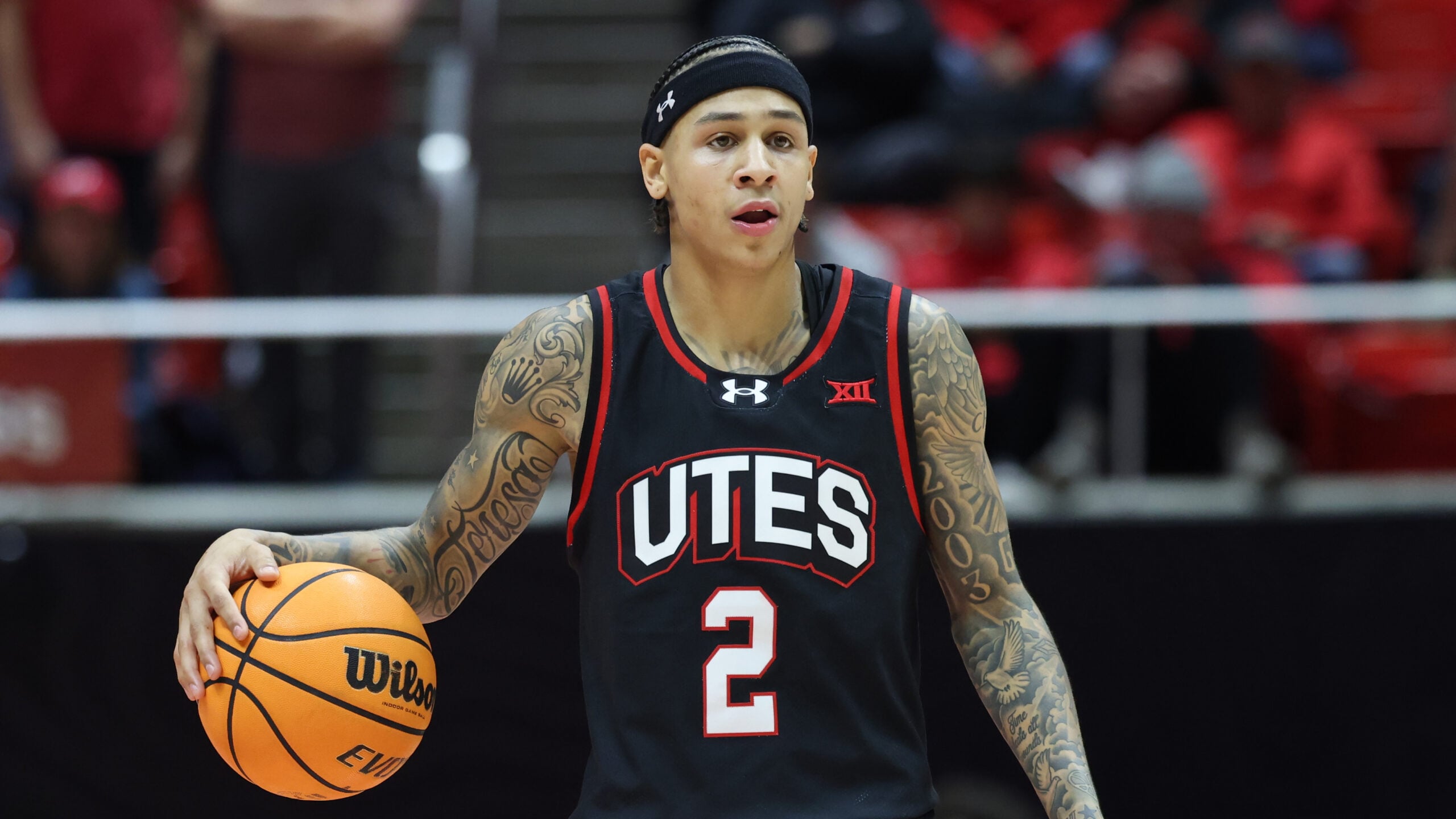 Dec 6, 2025; Salt Lake City, Utah, USA; Utah Utes guard Terrence Brown (2) brings the ball up the court against the California Baptist Lancers during the second half at Jon M. Huntsman Center. Mandatory Credit: Rob Gray-Imagn Images