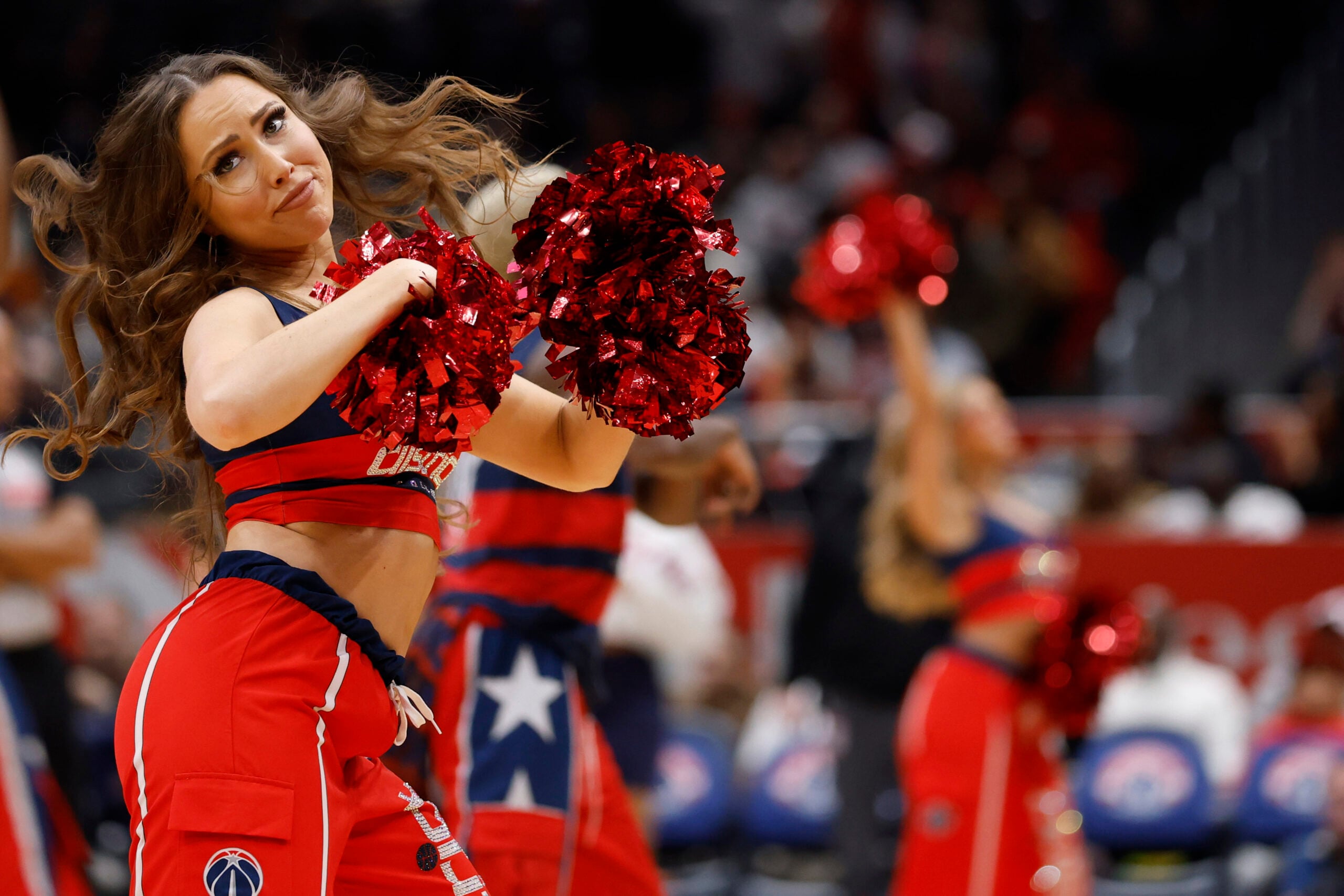 Dec 6, 2025; Washington, District of Columbia, USA; A member of the Washington Wizards Dancers dances during a timeout against the Atlanta Hawks in the second half at Capital One Arena. Mandatory Credit: Geoff Burke-Imagn Images