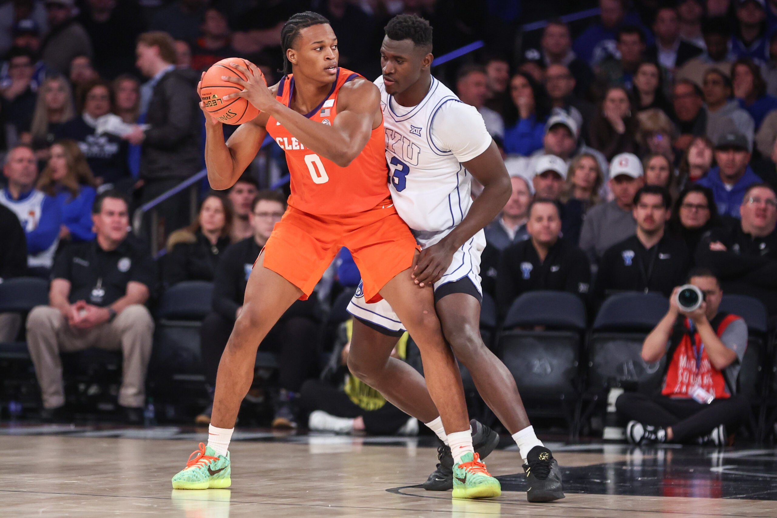 Dec 9, 2025; New York, New York, USA;  Clemson Tigers forward RJ Godfrey (0) and BYU Cougars center Keba Keita (13) at Madison Square Garden. Mandatory Credit: Wendell Cruz-Imagn Images
