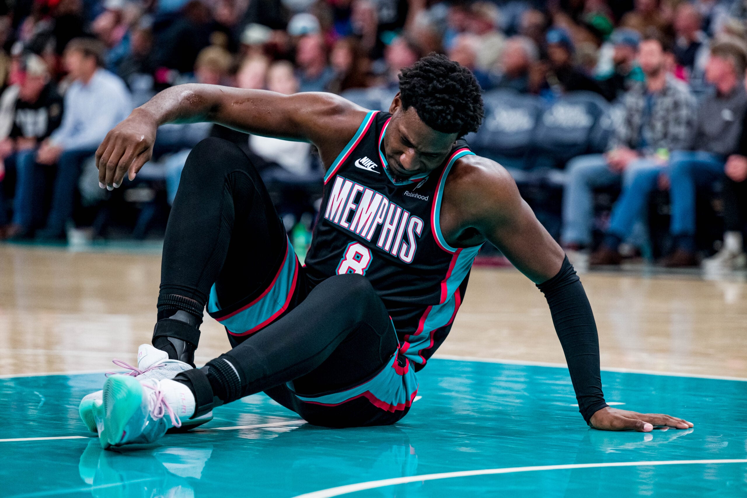 Dec 12, 2025; Memphis, Tennessee, USA; Memphis Grizzlies power forward Jaren Jackson Jr. (8) gets up in the second half against the Utah Jazz at FedExForum. Mandatory Credit: Matthew Smith-Imagn Images