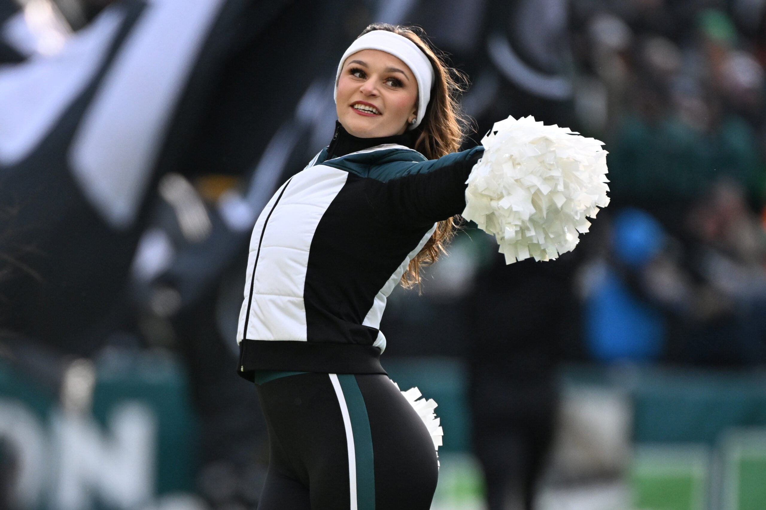 Dec 14, 2025; Philadelphia, Pennsylvania, USA; A Philadelphia Eagles cheerleader performs during halftime against the Las Vegas Raiders at Lincoln Financial Field. Mandatory Credit: Eric Hartline-Imagn Images