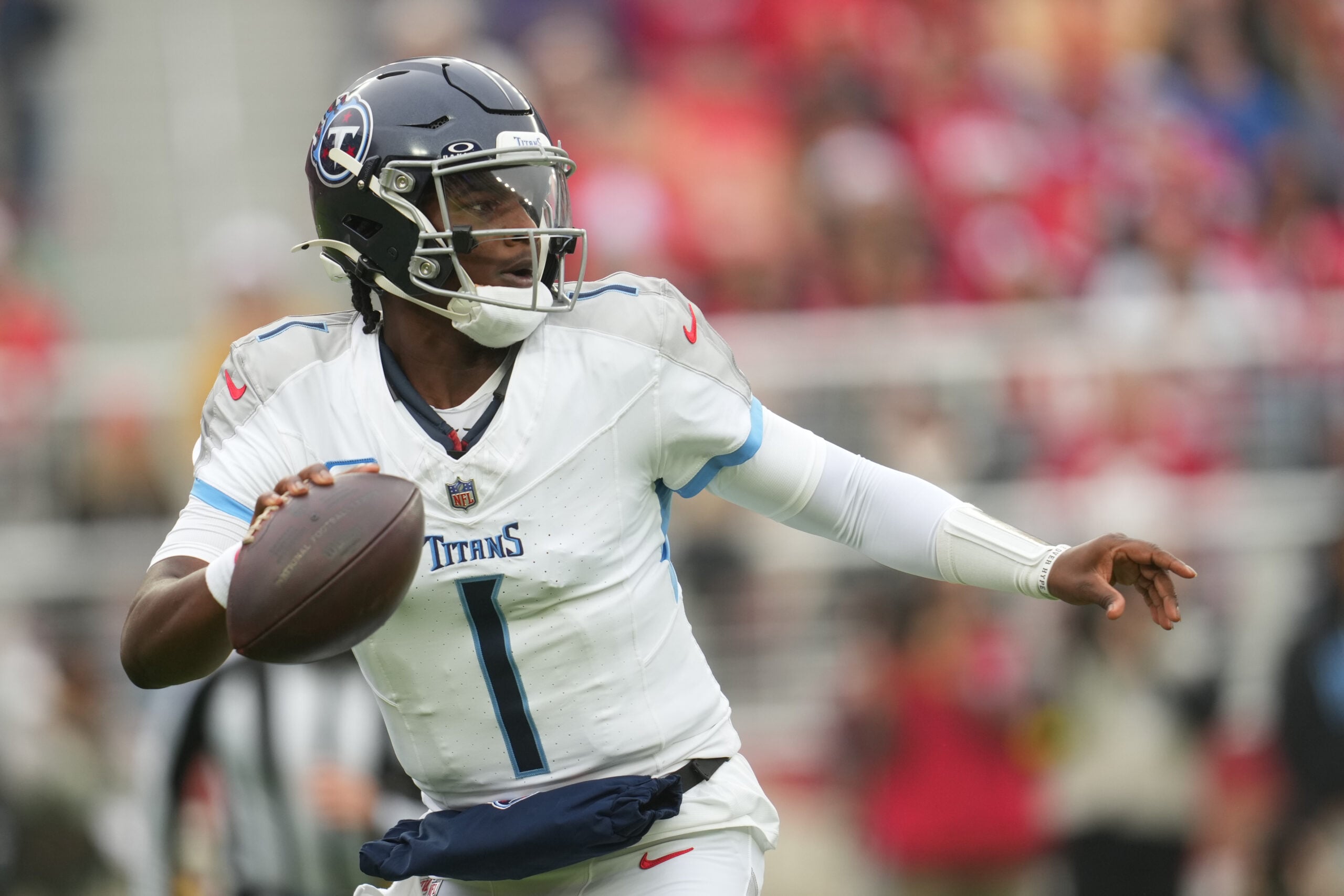 Dec 14, 2025; Santa Clara, California, USA;  Tennessee Titans quarterback Cam Ward (1) looks to pass during the first quarter against the San Francisco 49ers at Levi's Stadium. Mandatory Credit: Cary Edmondson-Imagn Images