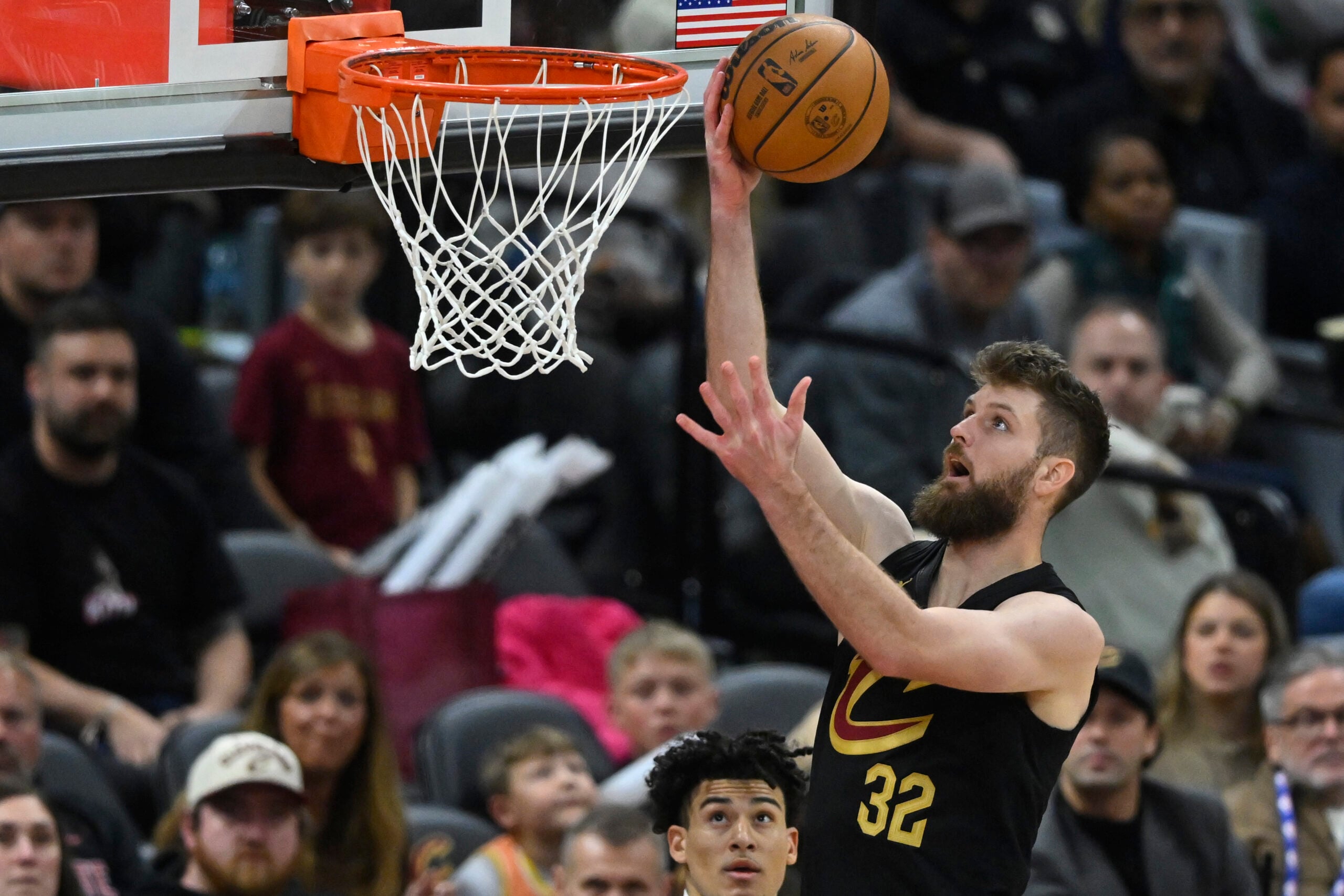 Dec 14, 2025; Cleveland, Ohio, USA; Cleveland Cavaliers forward Dean Wade (32) drives to the basket in the fourth quarter against the Charlotte Hornets at Rocket Arena. Mandatory Credit: David Richard-Imagn Images