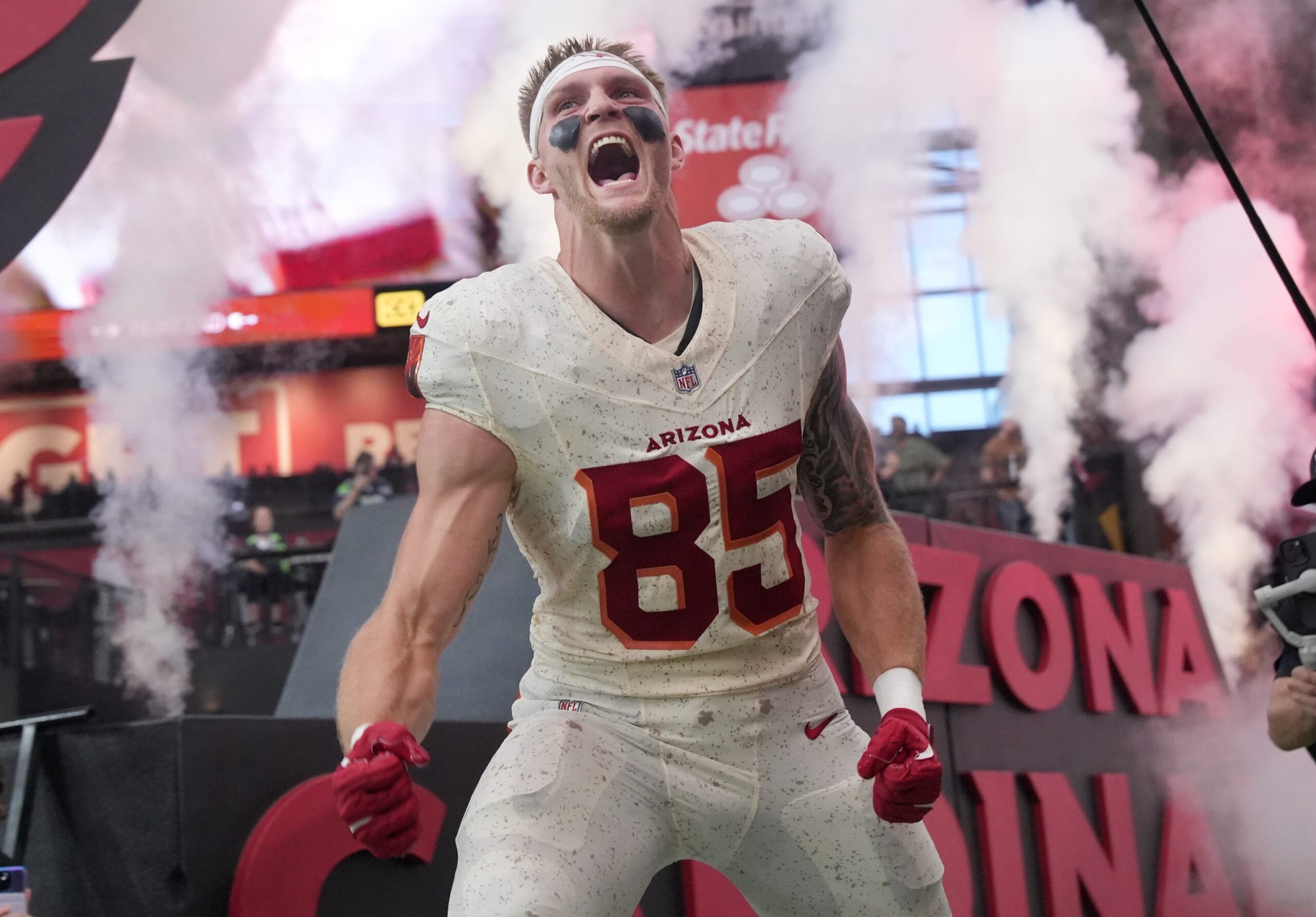Arizona Cardinals tight end Trey McBride (85) is introduced before the game against the Seattle Seahawks at State Farm Stadium on Sept. 25, 2025.