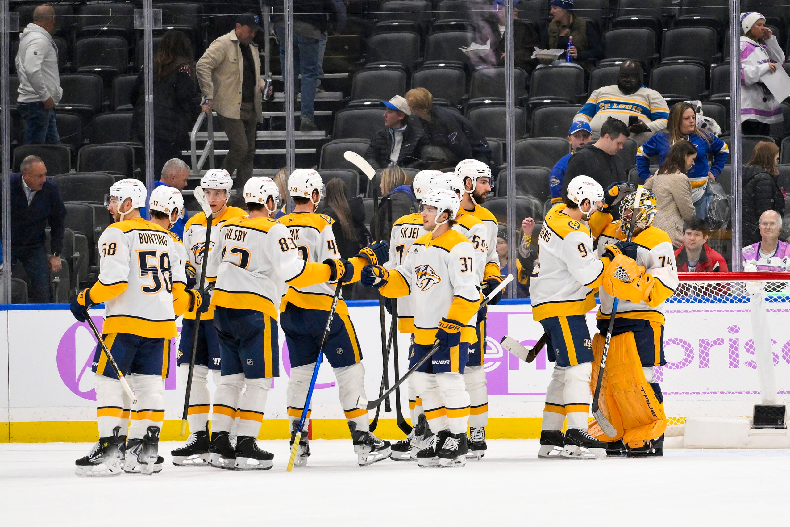 Dec 15, 2025; St. Louis, Missouri, USA; Nashville Predators left wing Filip Forsberg (9) and goaltender Juuse Saros (74) celebrate after the Predators defeated the St. Louis Blues at Enterprise Center. Mandatory Credit: Jeff Curry-Imagn Images