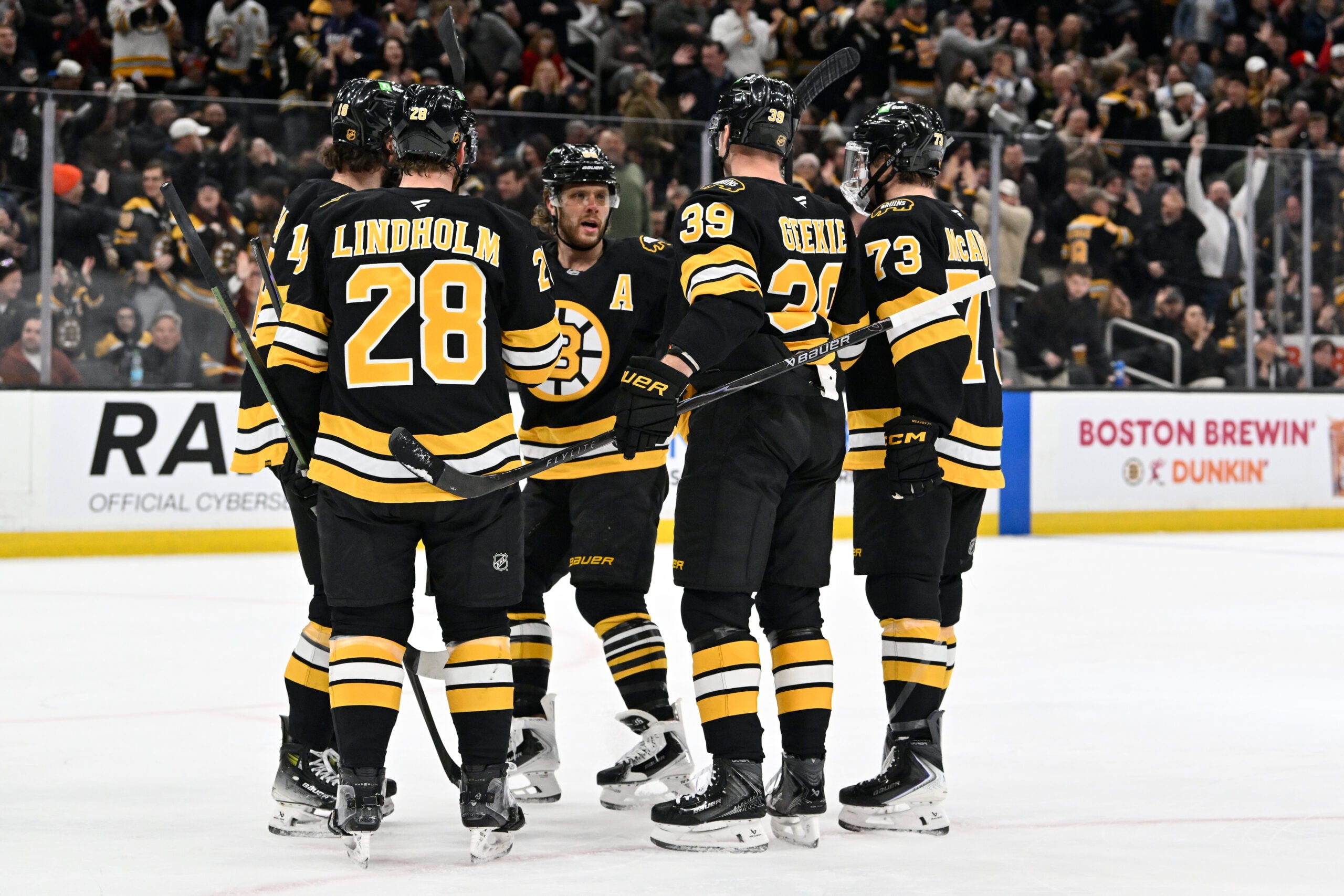 Dec 16, 2025; Boston, Massachusetts, USA; Boston Bruins center Morgan Geekie (39) celebrates his goal that was assisted by right wing David Pastrnak (88) during the first period against the Utah Mammoth at TD Garden. Mandatory Credit: Eric Canha-Imagn Images
