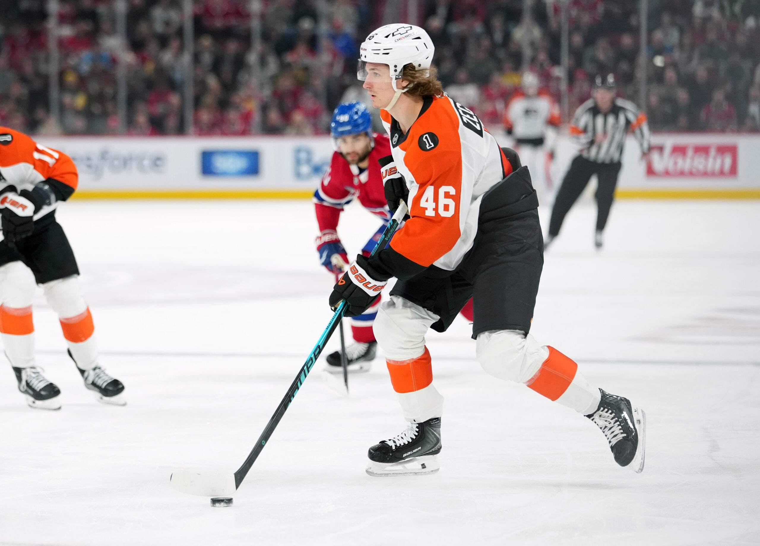 Dec 16, 2025; Montreal, Quebec, CAN; Philadelphia Flyers forward Trevor Zegras (46) plays the puck against the Montreal Canadians during the second period at the Bell Centre. Mandatory Credit: Eric Bolte-Imagn Images