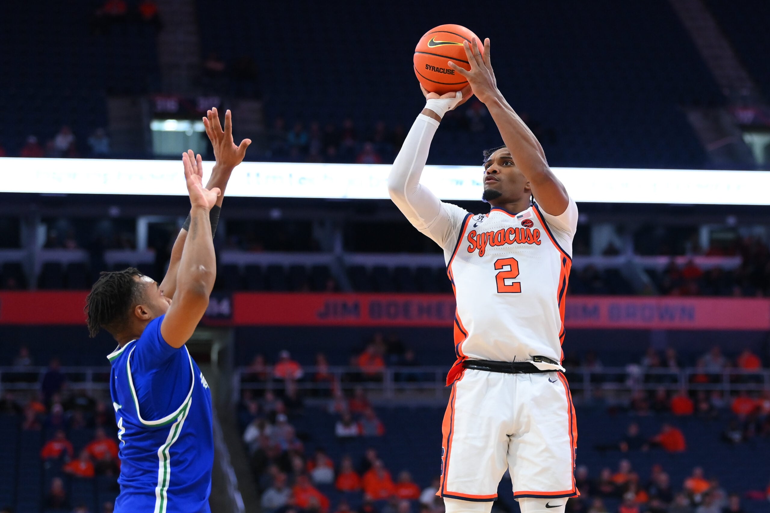 Dec 17, 2025; Syracuse, New York, USA; Syracuse Orange guard J.J. Starling (2) shoots against Mercyhurst Lakers guard Bernie Blunt (4) during the second half at the JMA Wireless Dome. Mandatory Credit: Rich Barnes-Imagn Images