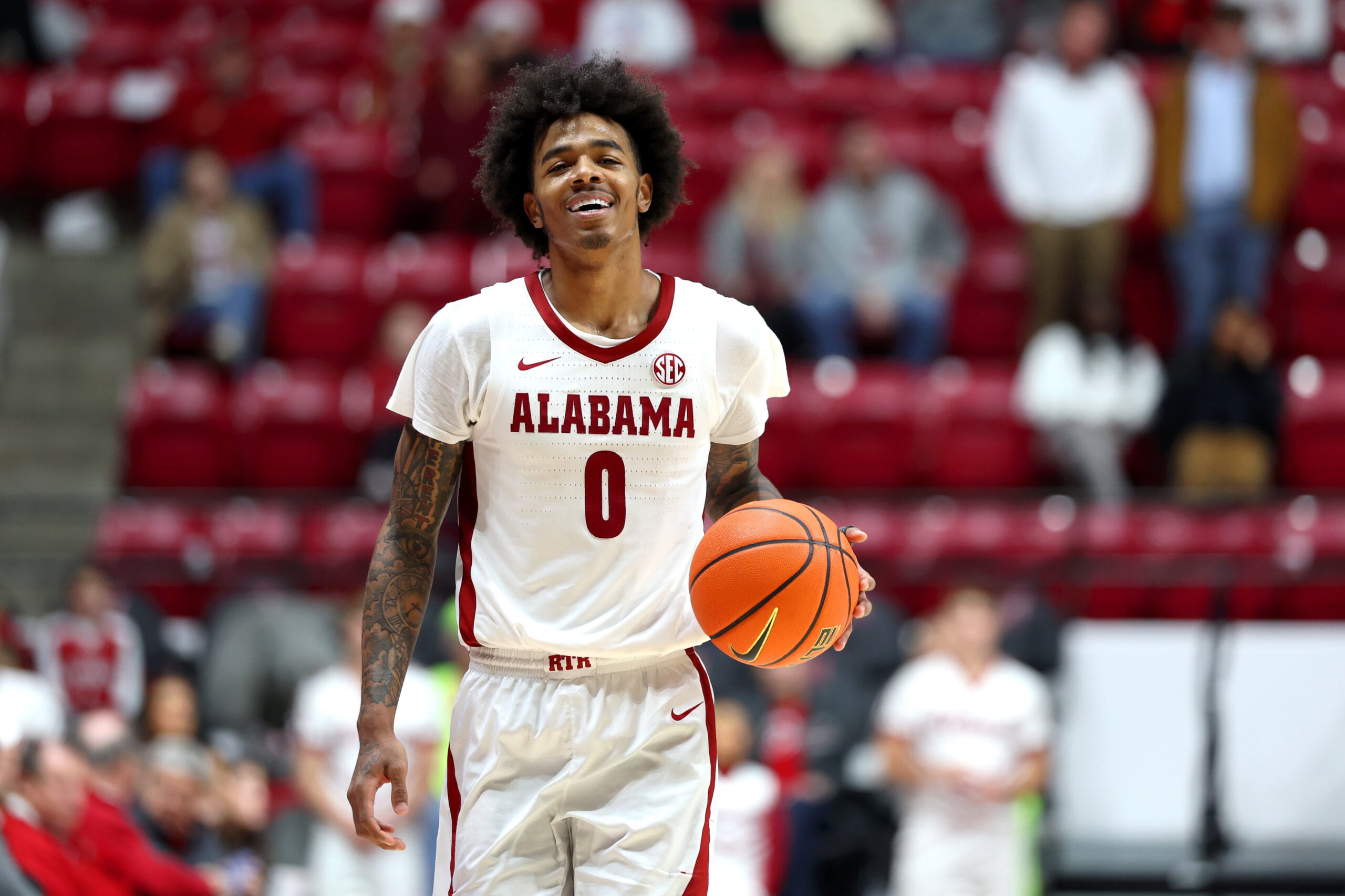 Dec 17, 2025; Tuscaloosa, Alabama, USA; Alabama Crimson Tide guard Labaron Philon (0) dribbles the ball during final minute of a game against the South Florida Bulls at Coleman Coliseum. Mandatory Credit: David Leong-Imagn Images