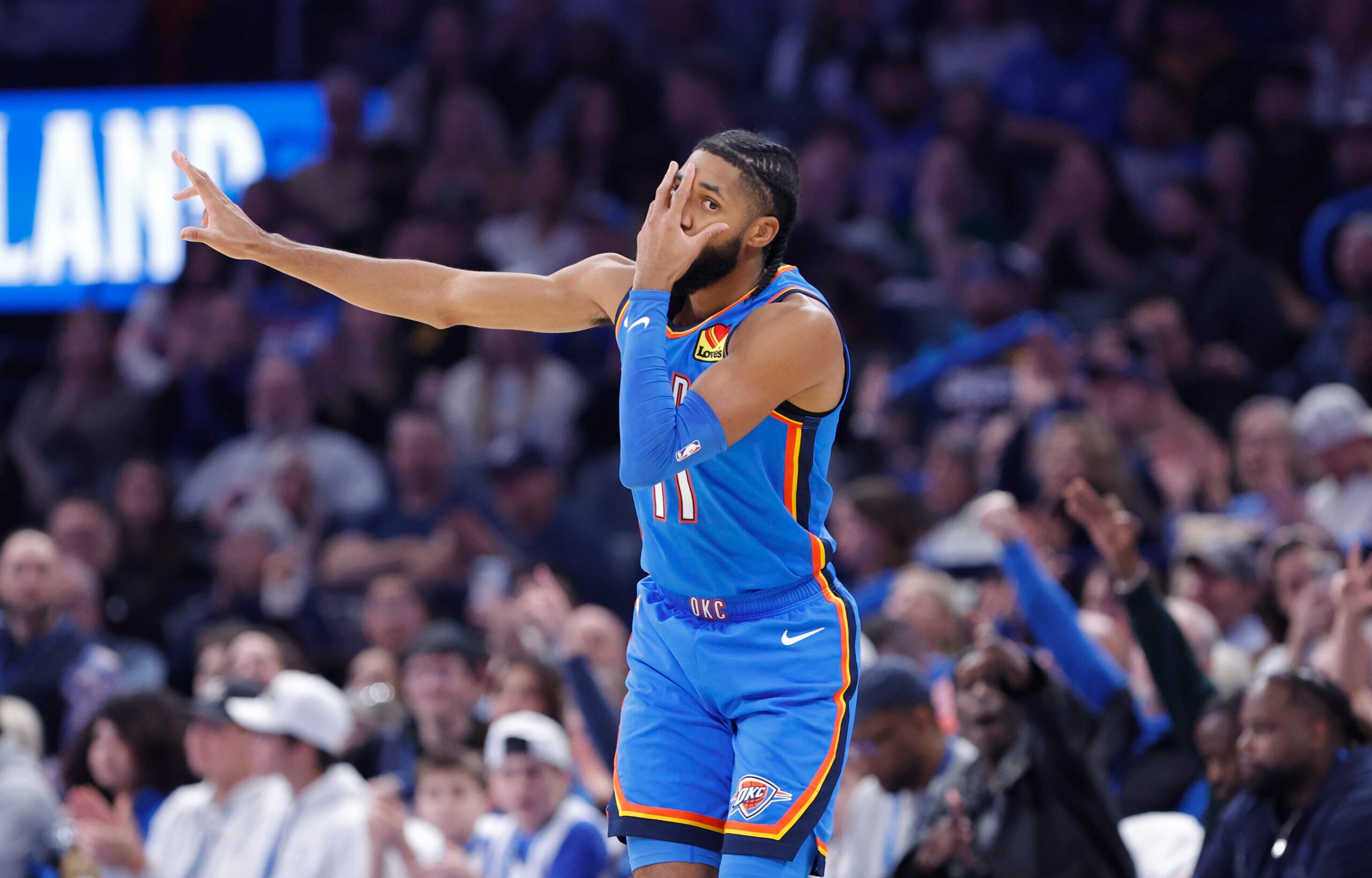 Dec 18, 2025; Oklahoma City, Oklahoma, USA; Oklahoma City Thunder guard Isaiah Joe (11) gestures after scoring against the Los Angeles Clippers during the second half at Paycom Center. Mandatory Credit: Alonzo Adams-Imagn Images