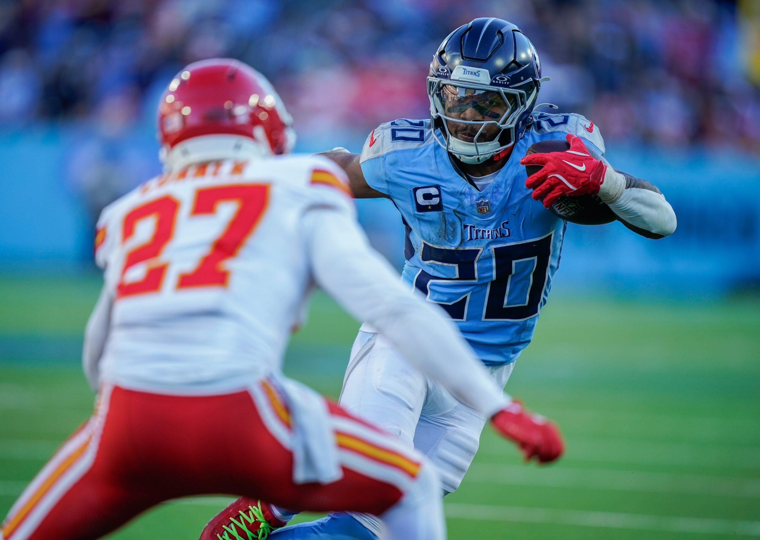 Tennessee Titans running back Tony Pollard (20) runs the ball during the fourth quarter against the Kansas City Chiefs at Nissan Stadium in Nashville, Tenn., Sunday, Dec. 21, 2025.