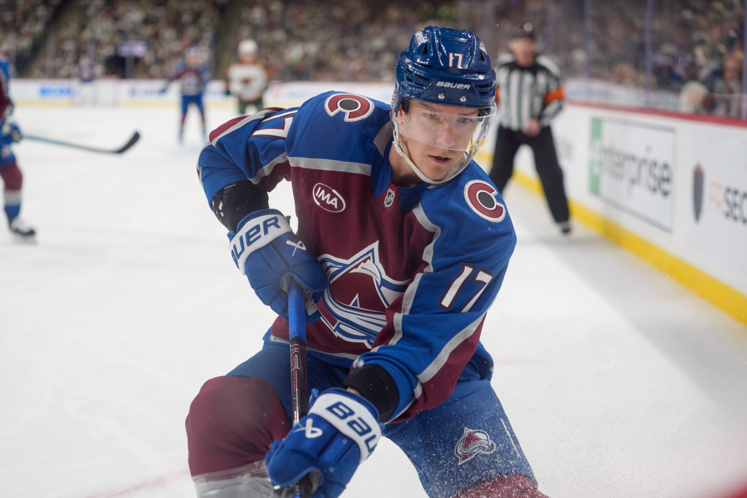 Dec 21, 2025; Saint Paul, Minnesota, USA; Colorado Avalanche center Parker Kelly (17) plays the puck in the corner against the Minnesota Wild in the first period at Grand Casino Arena. Mandatory Credit: Matt Blewett-Imagn Images