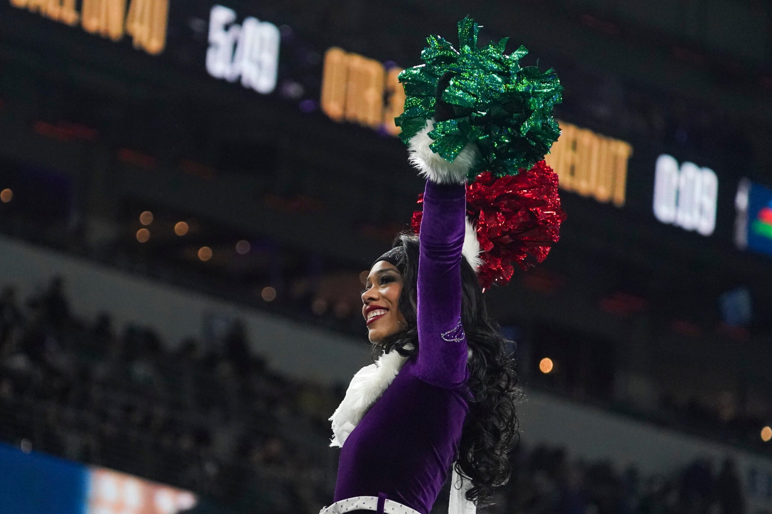 Dec 21, 2025; Baltimore, Maryland, USA; A Baltimore Ravens cheerleader performs during the second half of the game against the New England Patriots at M&T Bank Stadium. Mandatory Credit: James Lang-Imagn Images