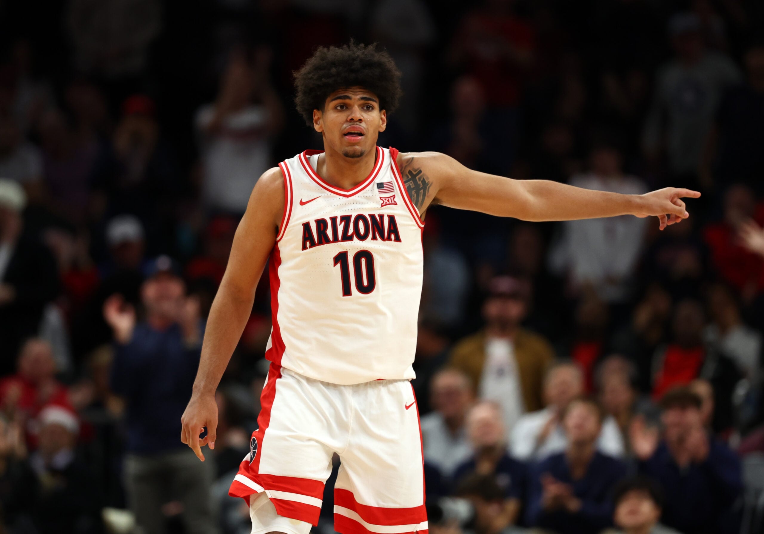Dec 20, 2025; Phoenix, Arizona, USA; Arizona Wildcats forward Koa Peat (10) against the San Diego State Aztecs during the Hall of Fame Series at Mortgage Matchup Center. Mandatory Credit: Mark J. Rebilas-Imagn Images