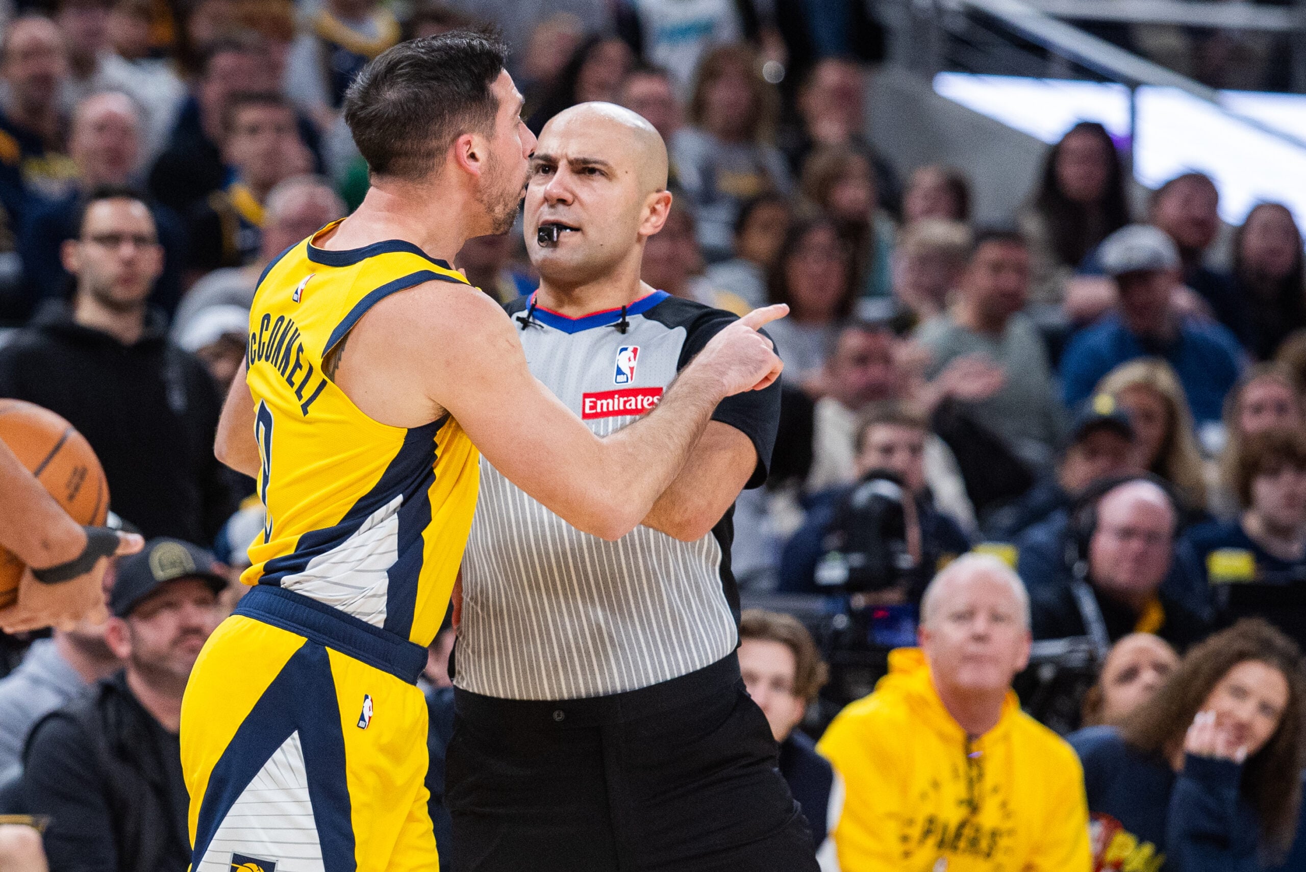 Dec 26, 2025; Indianapolis, Indiana, USA; Indiana Pacers guard T.J. McConnell (9) gets into an altercation with Boston Celtics guard Jordan Walsh (27) in the second half at Gainbridge Fieldhouse. Mandatory Credit: Trevor Ruszkowski-Imagn Images