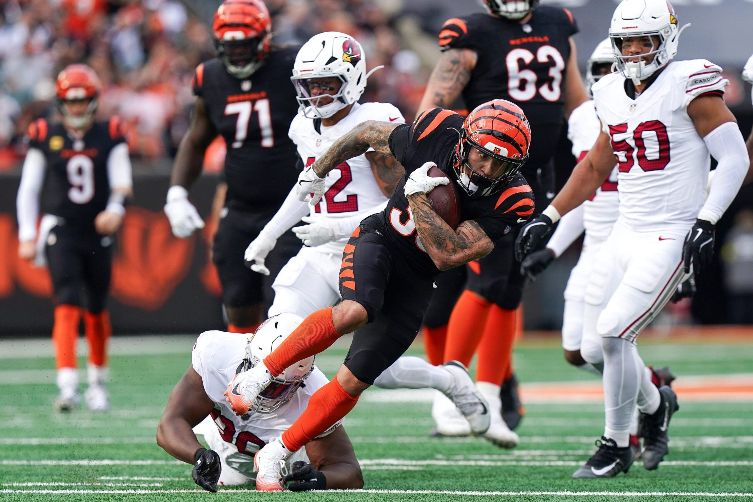 Cincinnati Bengals running back Chase Brown (30) runs the ball in the second quarter of a NFL game between the Cincinnati Bengals and Arizona Cardinals, Sunday, Dec. 28, 2025, at Paycor Stadium in downtown Cincinnati.