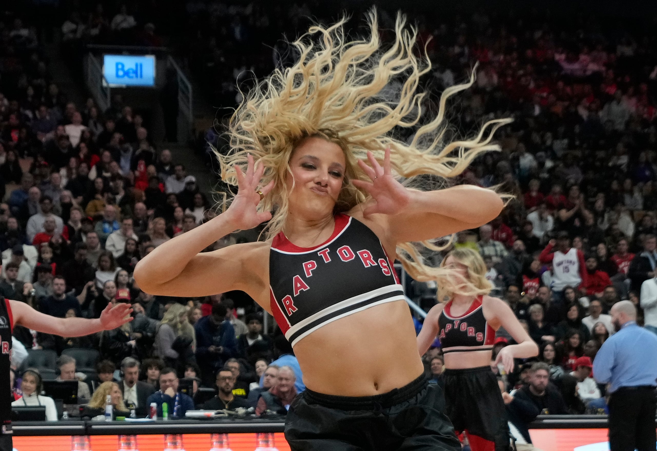 Dec 29, 2025; Toronto, Ontario, CAN;  A member of the  Toronto Raptors dance team performs during a break in the action against the Orlando Magic at Scotiabank Arena. Mandatory Credit: John E. Sokolowski-Imagn Images