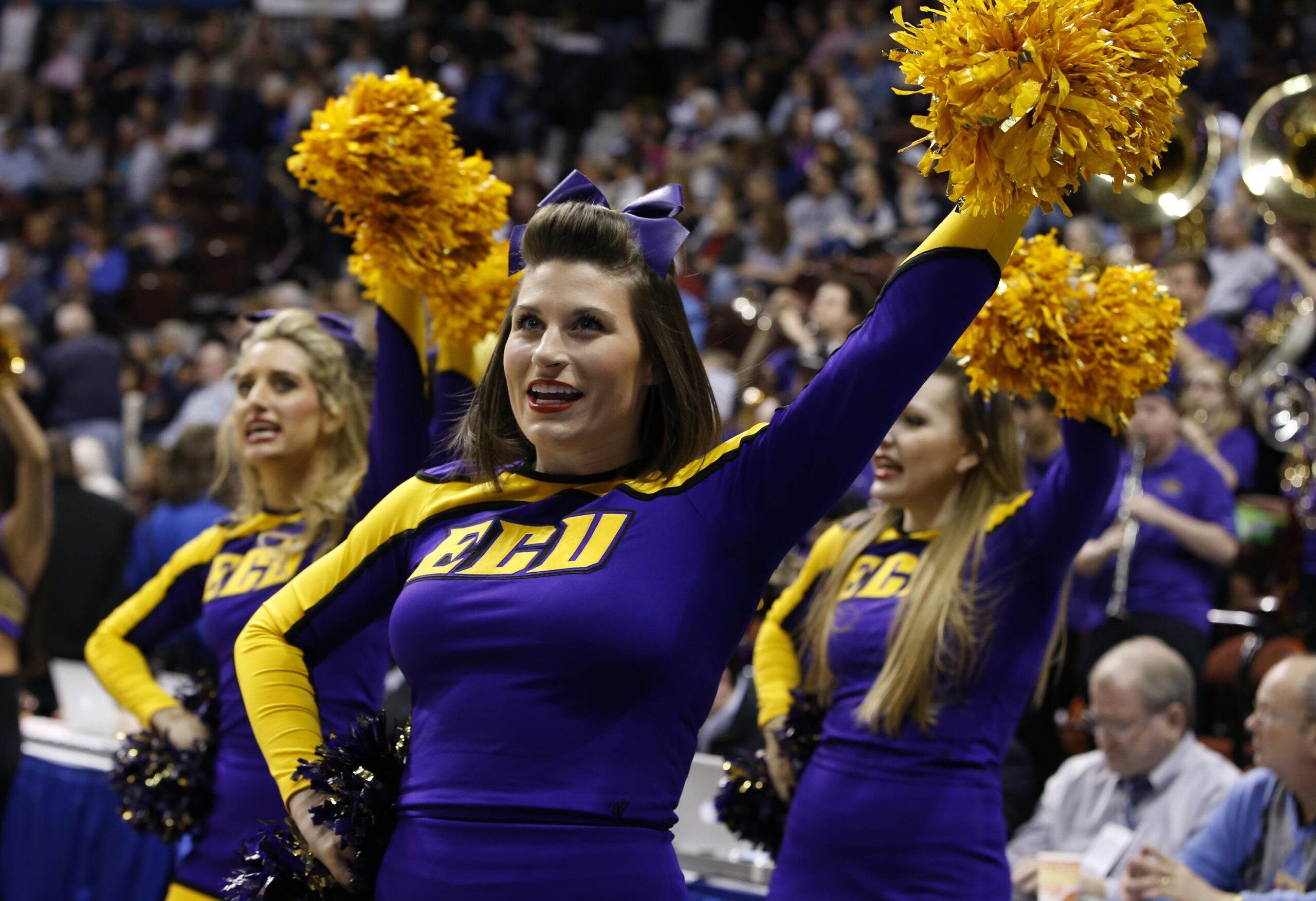 Mar 7, 2015; Uncasville, CT, USA; The East Carolina Lady Pirates cheerleaders perform during a break in  the action against the Temple Owls in the second half during the quarterfinal round of the American Conference Tournament at Mohegan Sun Arena. East Carolina defeated Temple 77-71. Mandatory Credit: David Butler II-Imagn Images