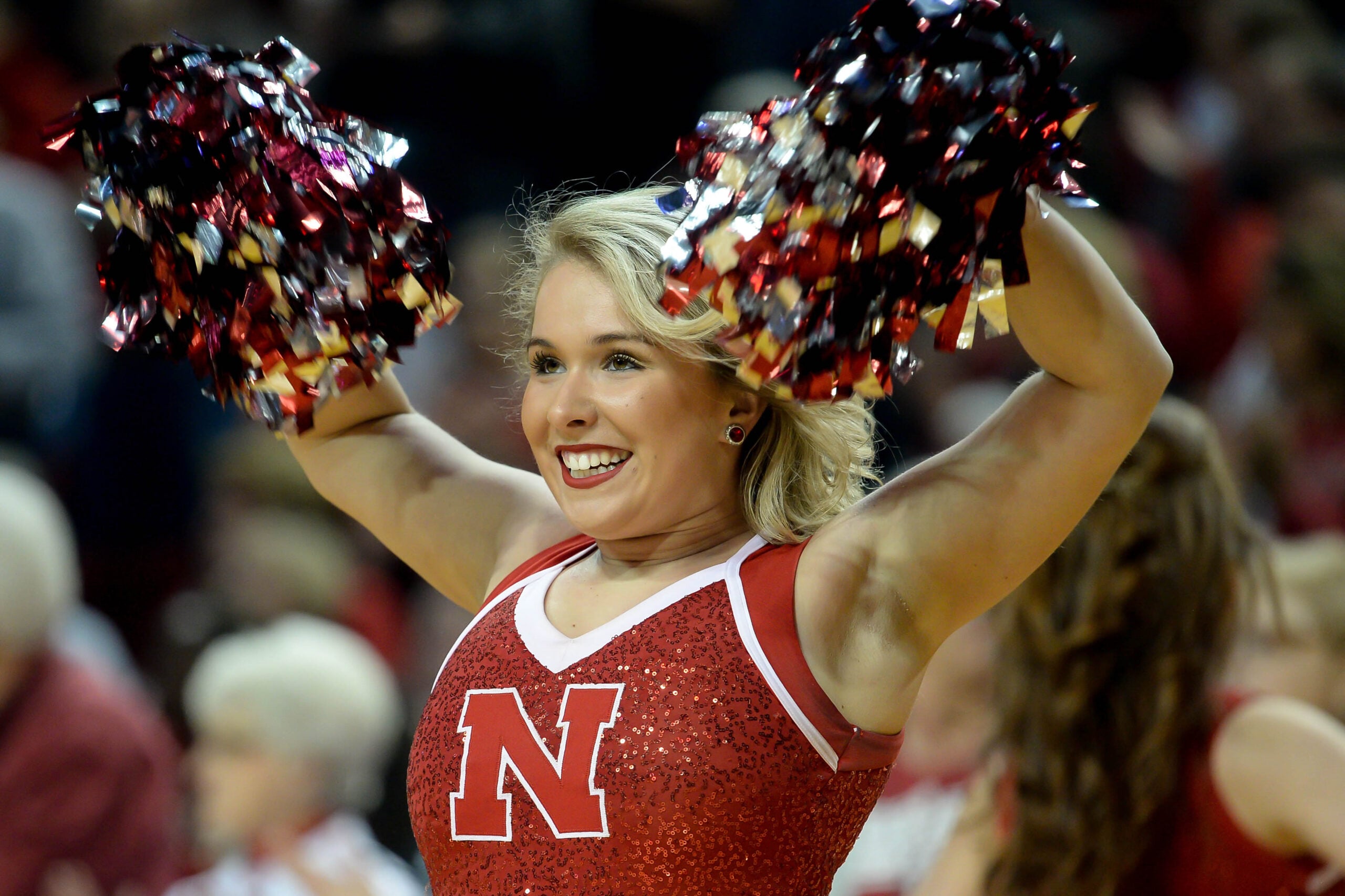 Dec 21, 2016; Lincoln, NE, USA; A Nebraska Cornhuskers cheerleaders performs during a break in the game against the Connecticut Huskies at Pinnacle Bank Arena. Mandatory Credit: Steven Branscombe-Imagn Images