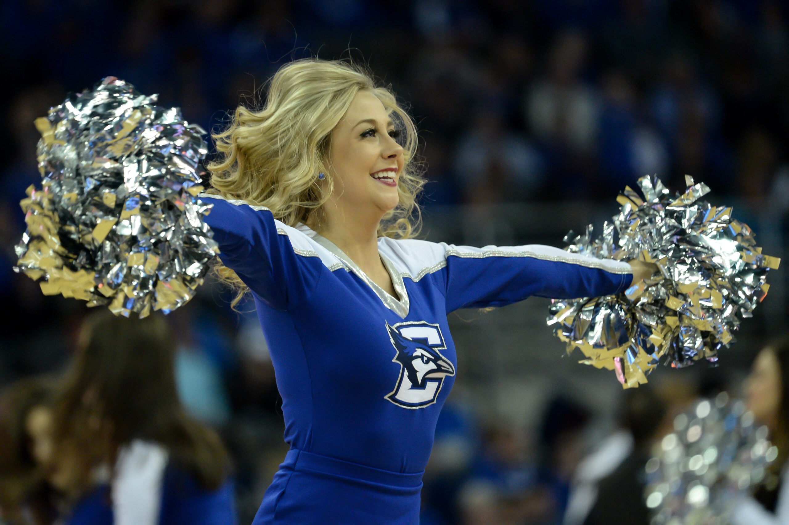 Jan 11, 2017; Omaha, NE, USA;  A Creighton Bluejays cheerleader performs during a break in the game against the Butler Bulldogs at CenturyLink Center Omaha. Creighton defeated Butler 75-64. Mandatory Credit: Steven Branscombe-Imagn Images