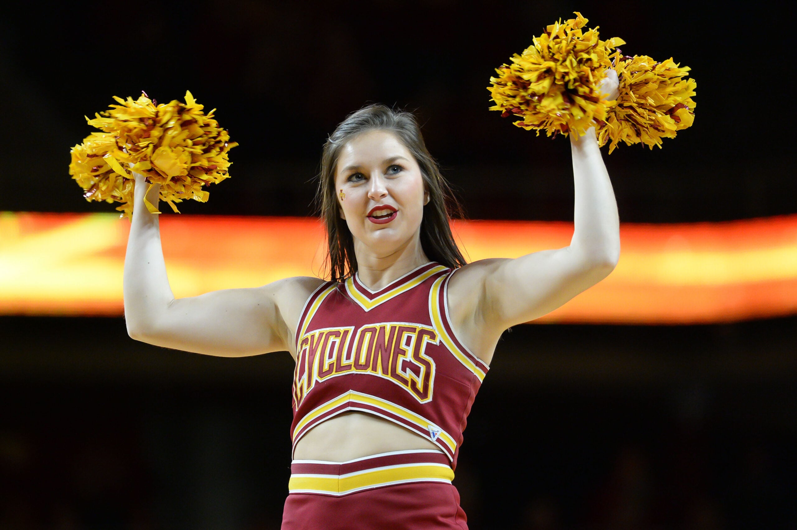 Jan 20, 2018; Ames, IA, USA; An Iowa State Cyclones cheerleader perfroms against the Texas Tech Red Raiders during the second half at James H. Hilton Coliseum. Mandatory Credit: Steven Branscombe-Imagn Images