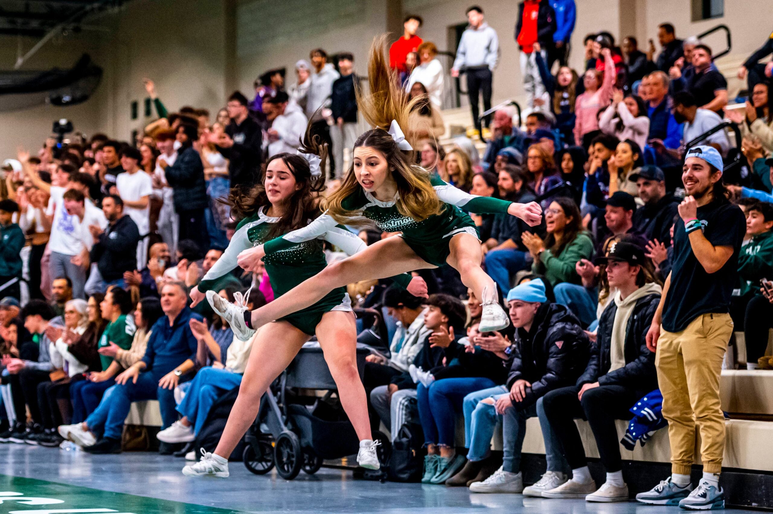 Dartmouth cheerleaders celebrate Donovan Burgo hitting his free throws.