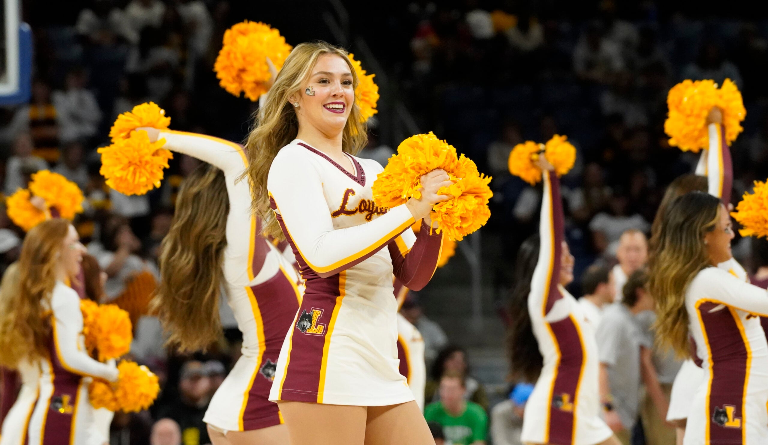 Nov 8, 2023; Chicago, Illinois, USA; Loyola Ramblers cheerleaders during the second half at Wintrust Arena. Mandatory Credit: David Banks-Imagn Images