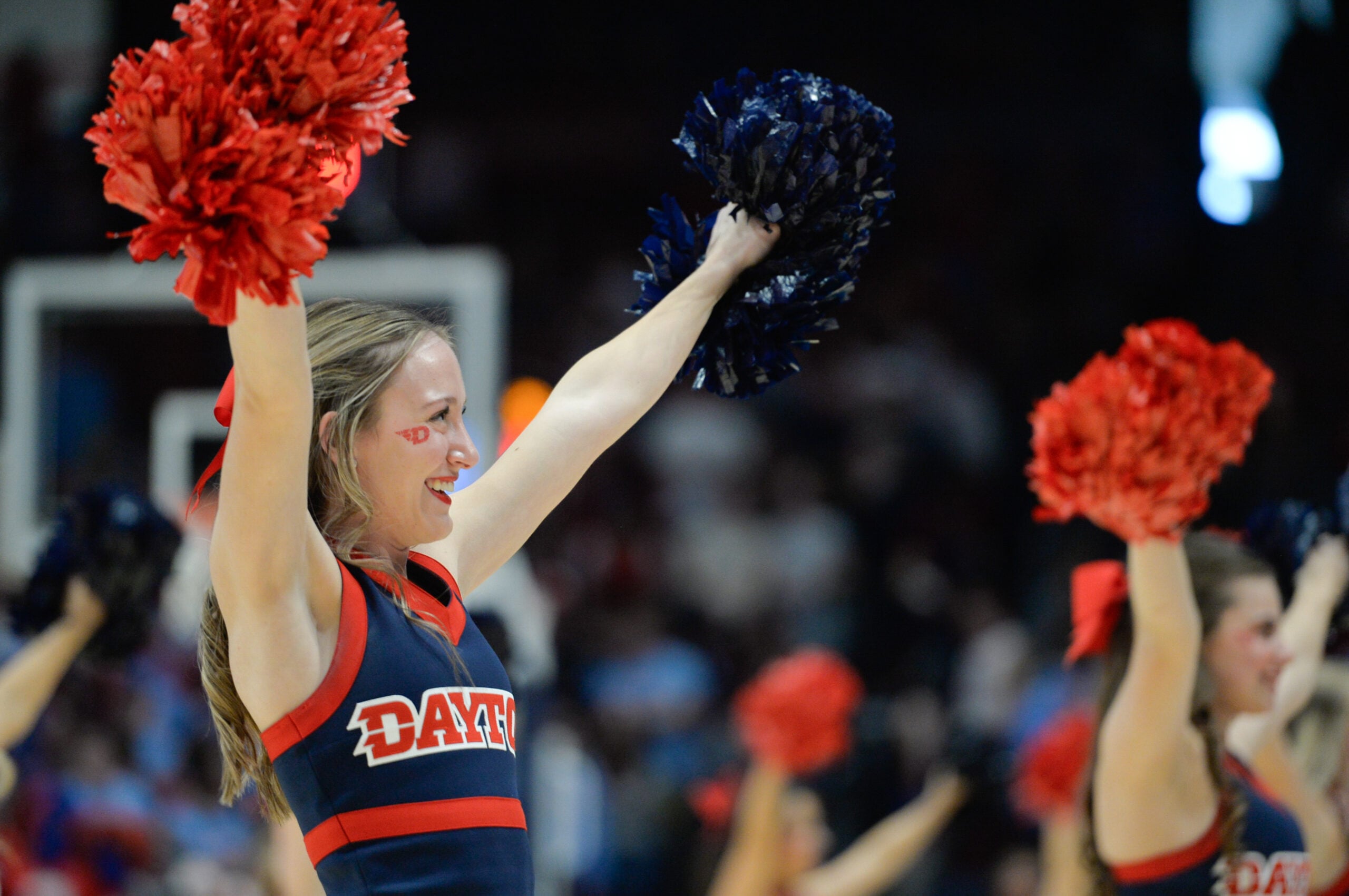 Feb 17, 2024; Dayton, Ohio, USA;  The Dayton Flyers cheerleaders perform during a timeout during the game against Fordham at University of Dayton Arena. Mandatory Credit: Matt Lunsford-Imagn Images