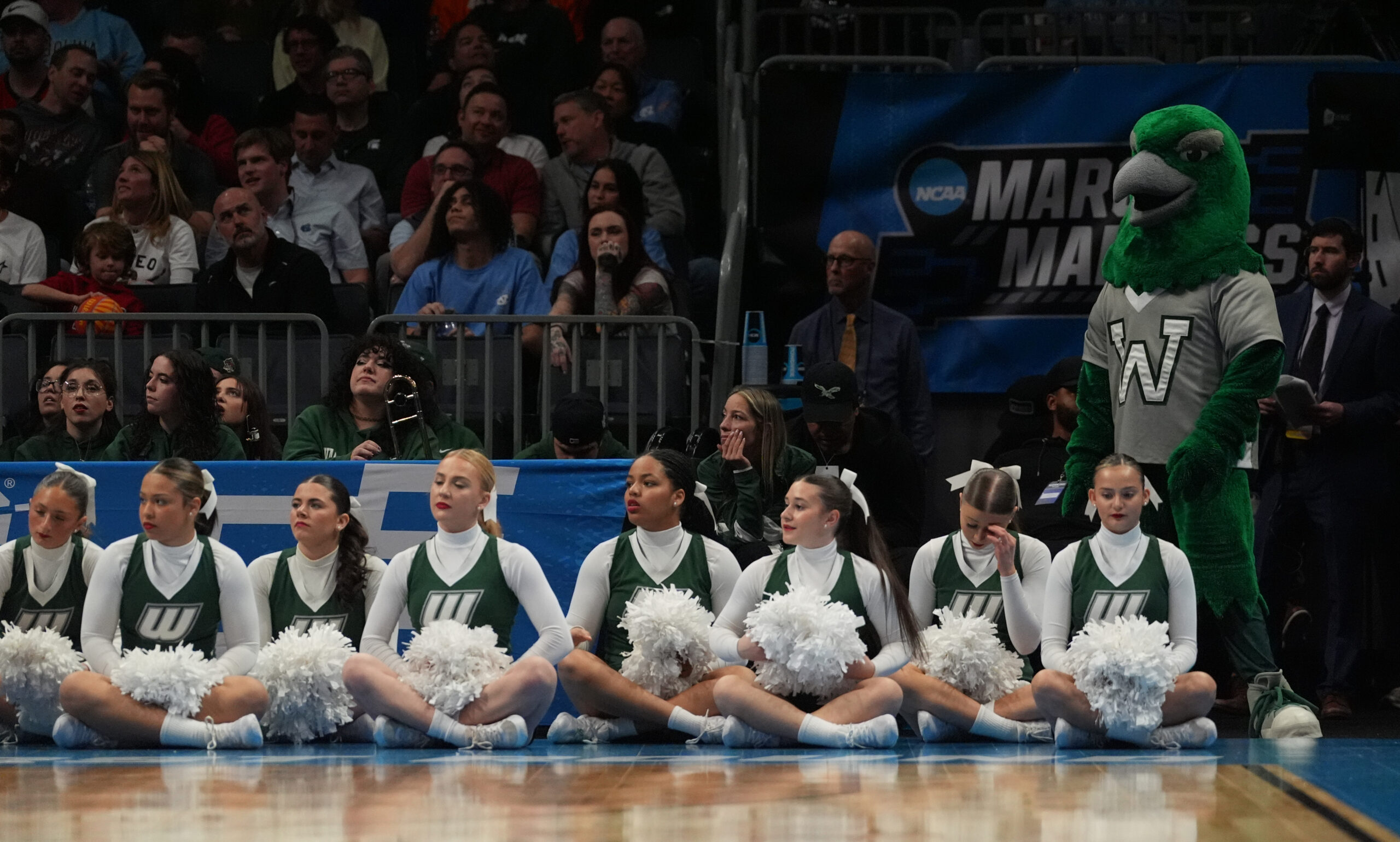 March 21, 2024, Charlotte, NC, USA; Wagner Seahawks cheerleaders and mascot look on against the North Carolina Tar Heels in the first round of the 2024 NCAA Tournament at the Spectrum Center. Mandatory Credit: Jim Dedmon-Imagn Images