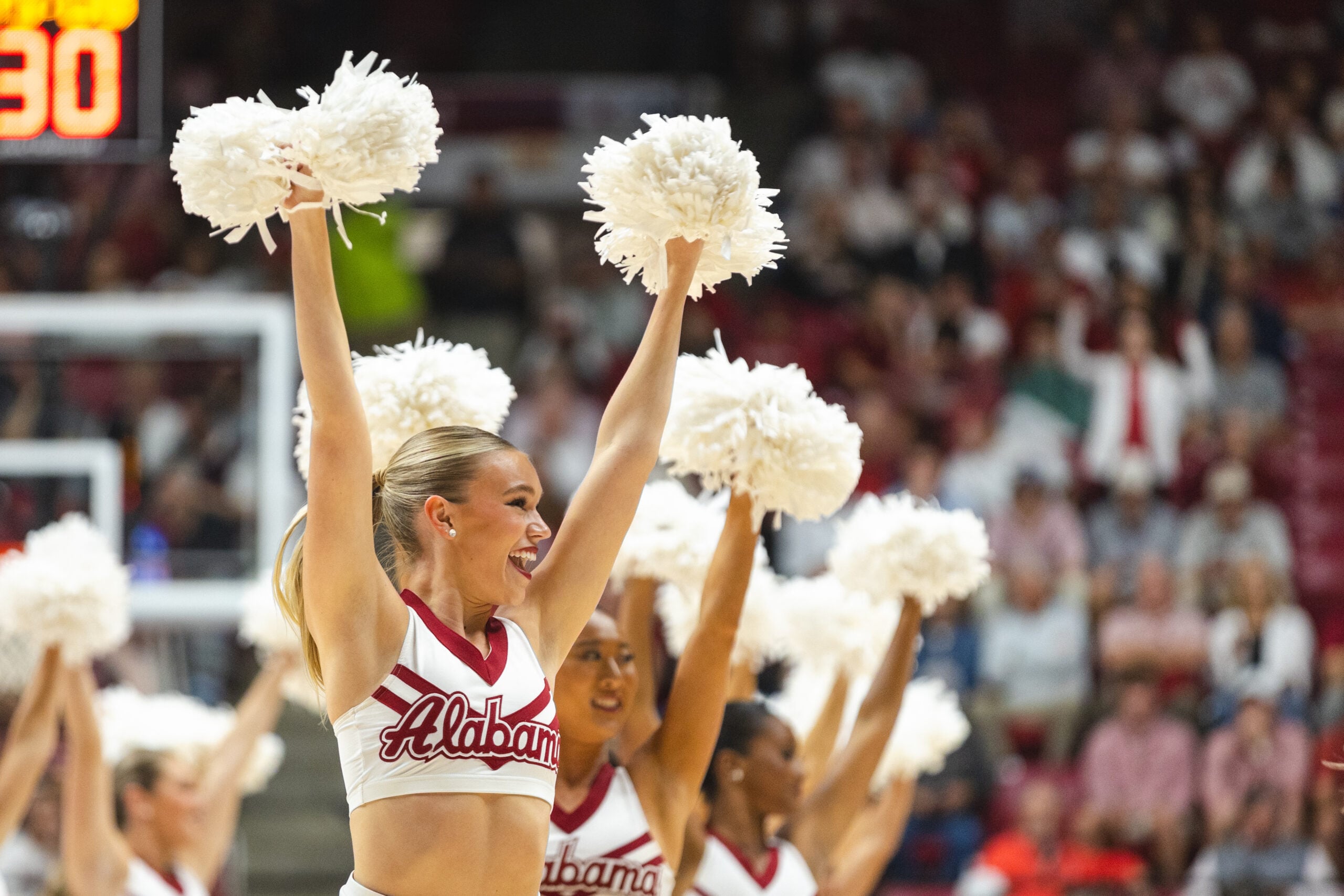 Nov 11, 2024; Tuscaloosa, Alabama, USA; Alabama Crimson Tide cheerleaders cheer on their team during a timeout in the second half at Coleman Coliseum. Mandatory Credit: Will McLelland-Imagn Images