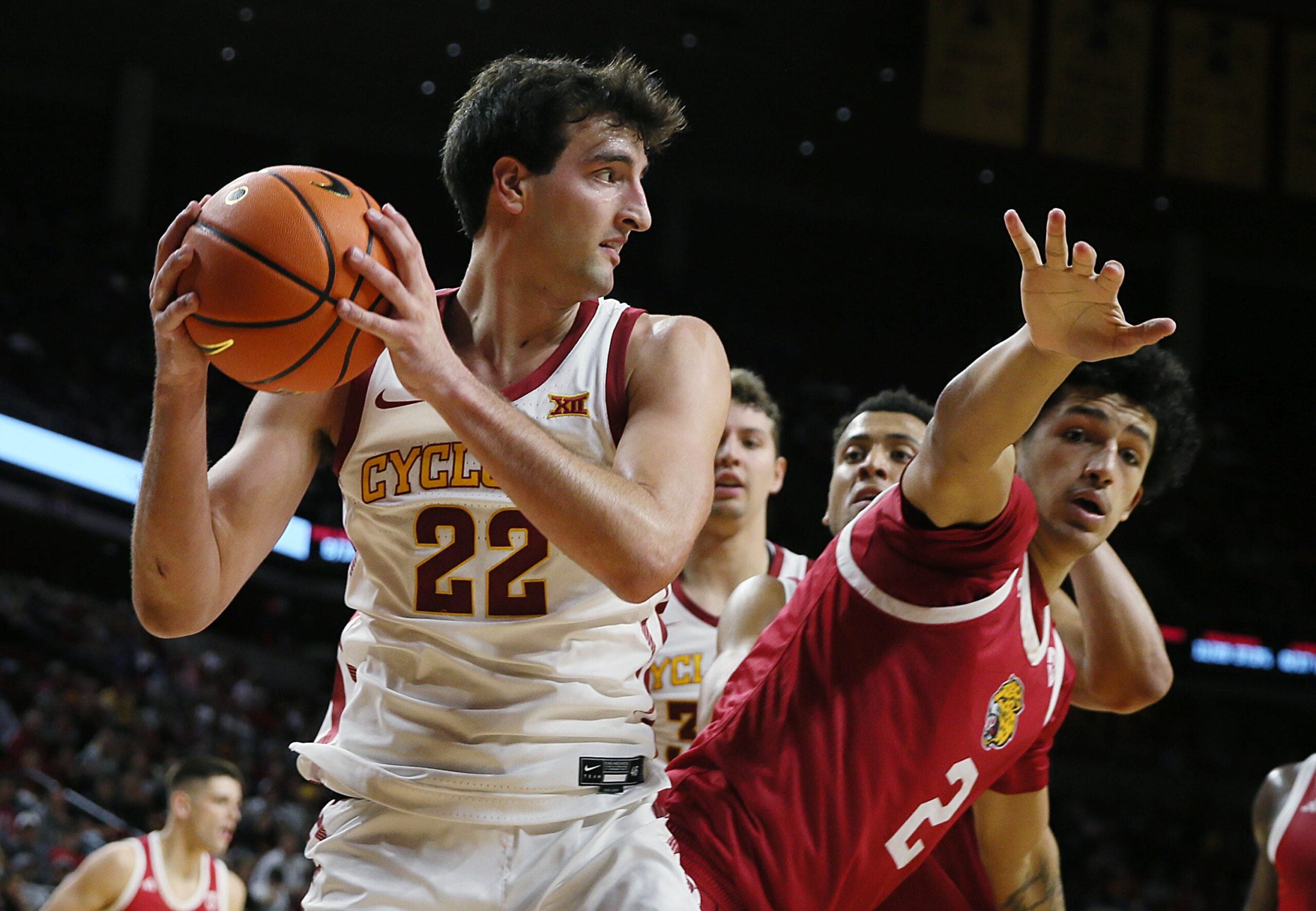 Iowa State Cyclones forward Milan Momcilovic (22) looks for pass as IU Indianapolis Jaguars forward DeSean Goode (2) defends during the second half in the NCAA men’s basketball at Hilton Coliseum on Monday, Nov. 18, 2024, in Ames, Iowa.