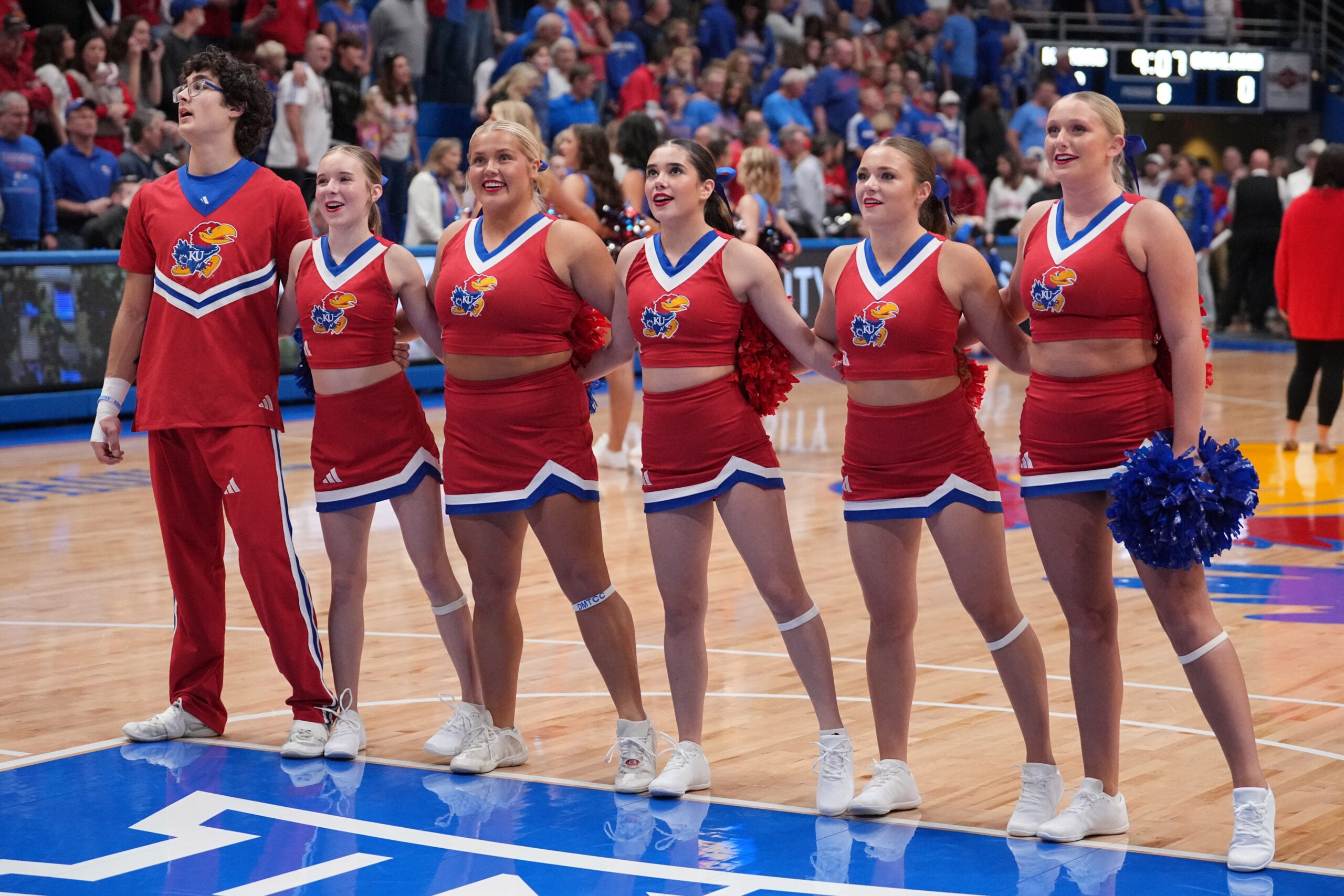 Nov 16, 2024; Lawrence, Kansas, USA; Kansas Jayhawks cheerleaders performs prior to a game against the Oakland Golden Grizzlies at Allen Fieldhouse. Mandatory Credit: Denny Medley-Imagn Images