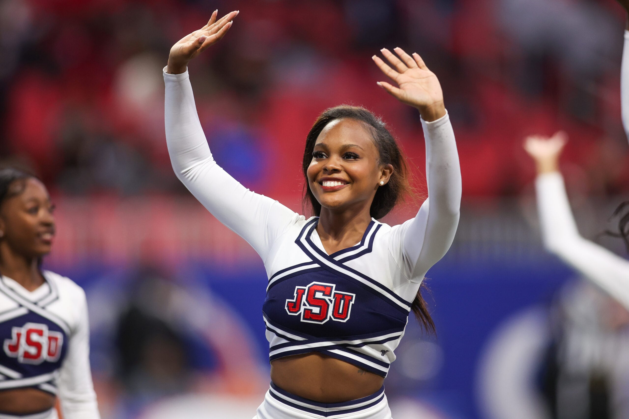 Dec 14, 2024; Atlanta, GA, USA; South Carolina State Bulldogs cheerleader performs against the Jackson State Tigers in the fourth quarter at Mercedes-Benz Stadium. Mandatory Credit: Brett Davis-Imagn Images