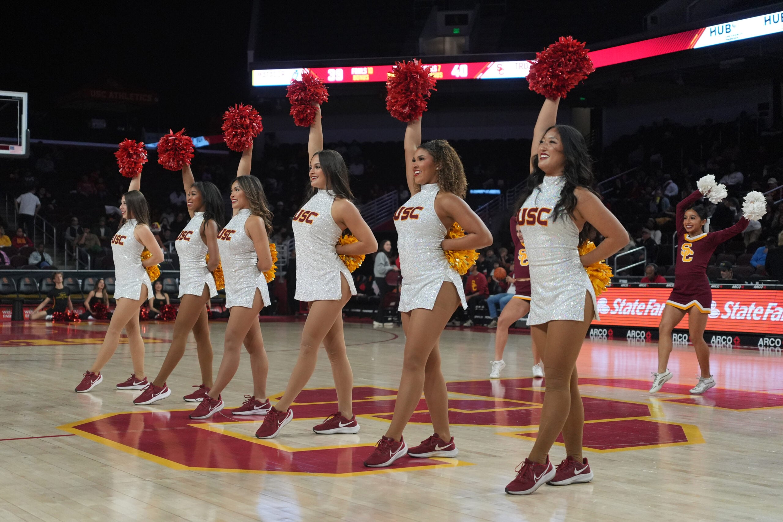 Dec 18, 2024; Los Angeles, California, USA; Southern California Trojans song girls cheerleaders perform during the game against the Cal State Northridge Matadors at Galen Center. Mandatory Credit: Kirby Lee-Imagn Images