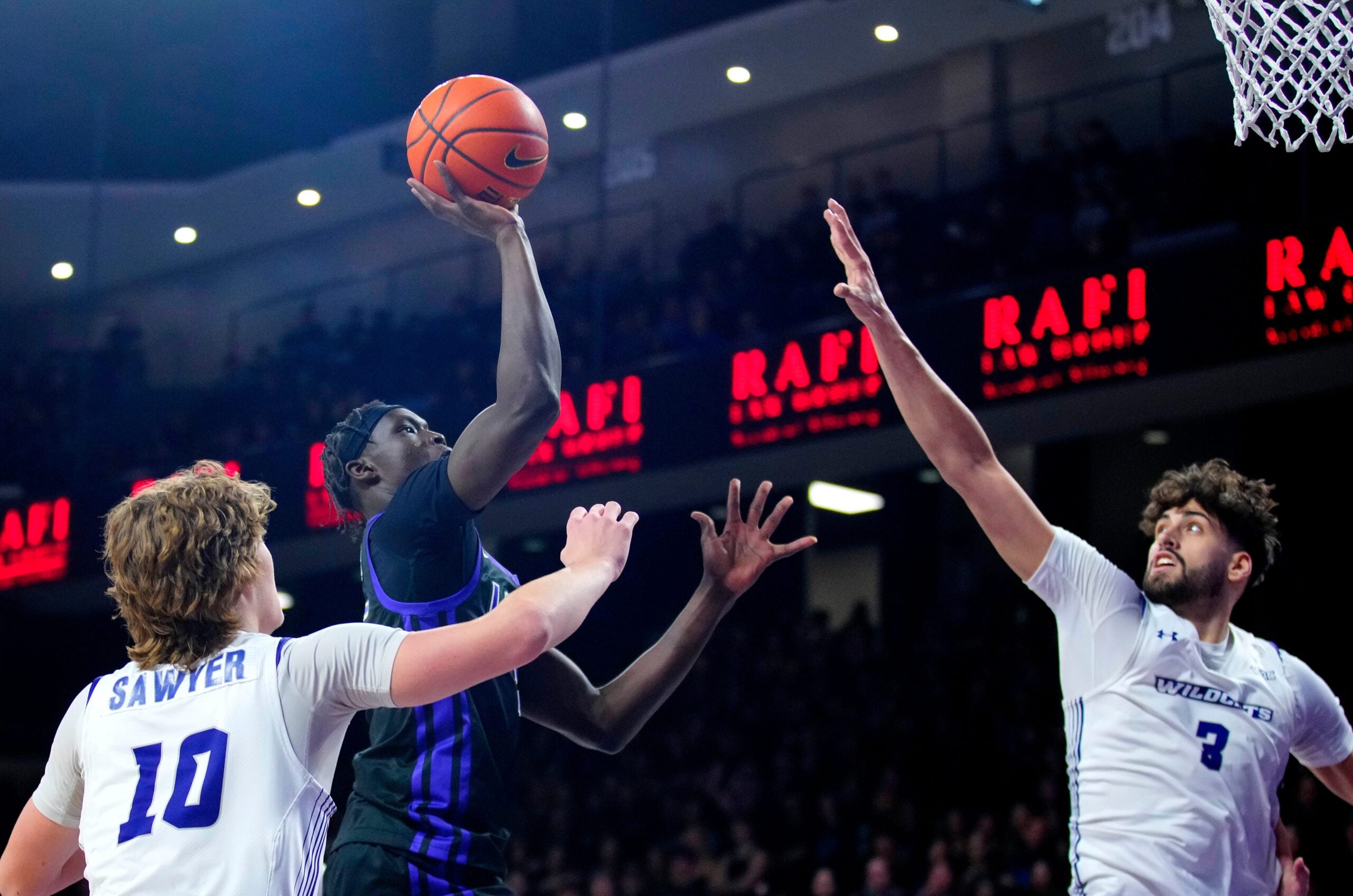 GCU forward Lök Wur (5) shoots a floater against ACU forward Leonardo Bettiol (3) during a game at Grand Canyon University on Jan. 16, 2025, in Phoenix.