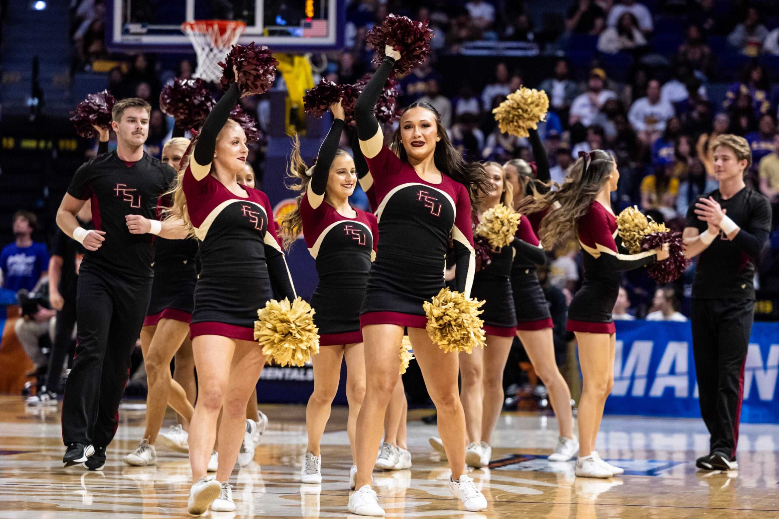 Mar 22, 2025; Baton Rouge, Louisiana, USA;  Florida State Seminoles cheerleaders on a time out against the George Mason Patriots during the second half at Pete Maravich Assembly Center. Mandatory Credit: Stephen Lew-Imagn Images