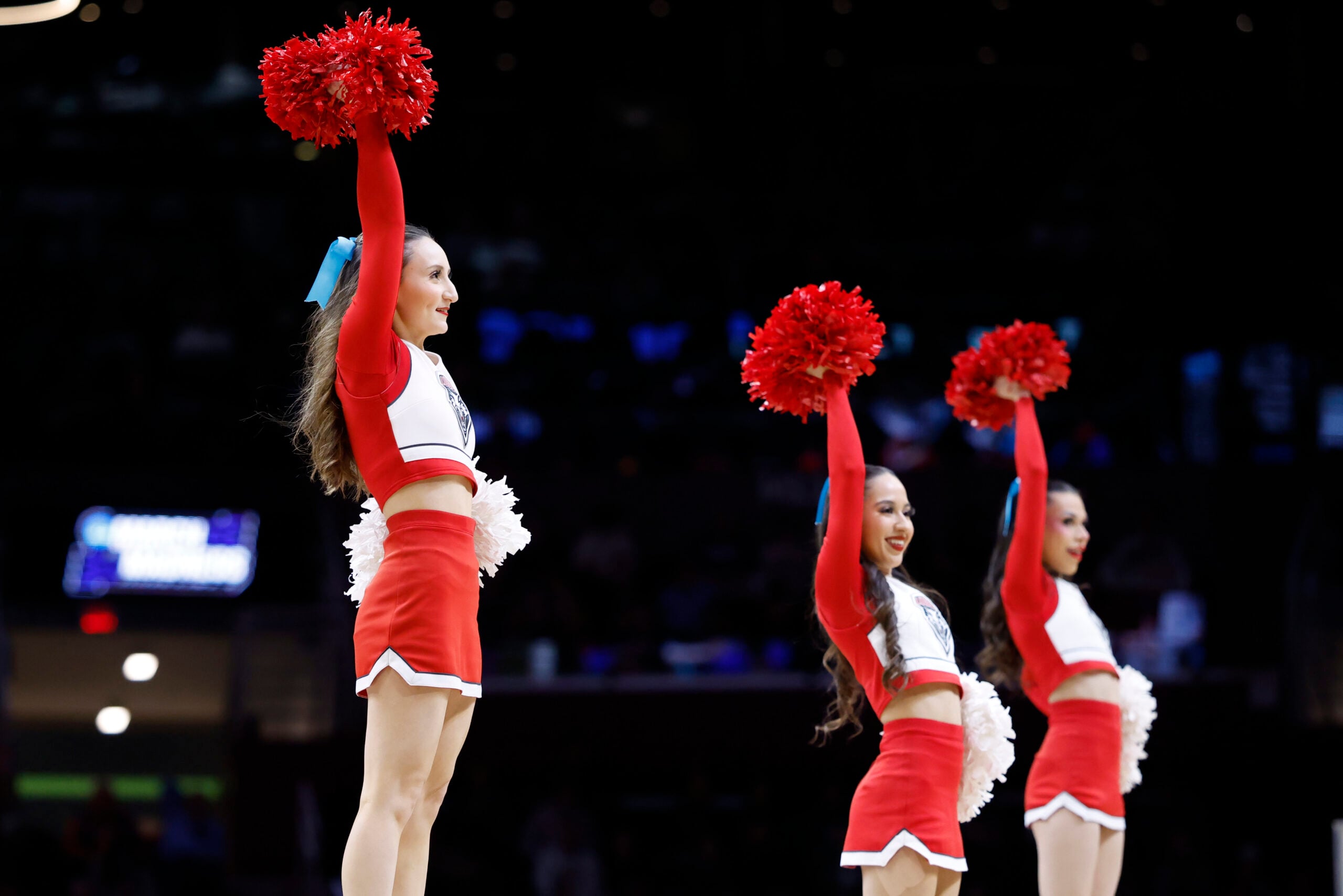 Mar 23, 2025; Cleveland, OH, USA; New Mexico Lobos cheerleaders perform in the first half against the Michigan State Spartans during the NCAA Tournament Second Round at Rocket Arena. Mandatory Credit: Rick Osentoski-Imagn Images