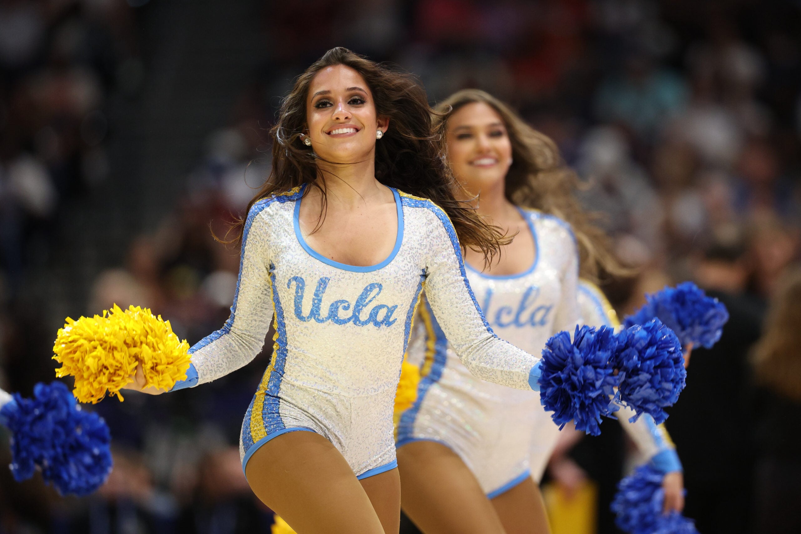 Apr 4, 2025; Tampa, FL, USA;  The UCLA Bruins cheerleaders perform during second quarter in a semifinal of the women's 2025 NCAA tournament against the Connecticut Huskies at Amalie Arena. Mandatory Credit: Nathan Ray Seebeck-Imagn Images