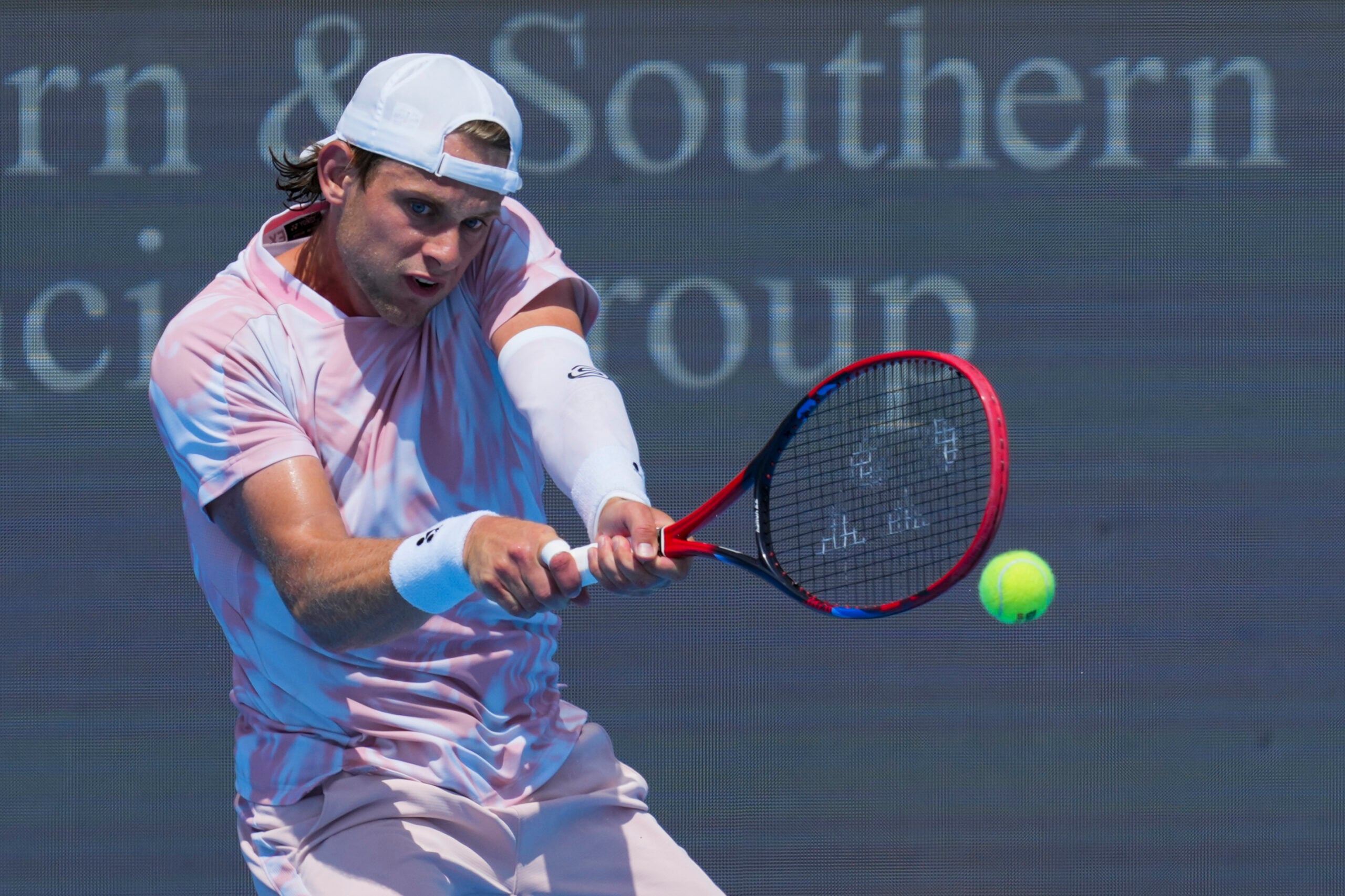 Aug 7, 2025; Cincinnati, OH, USA; Zizou Bergs (BEL) returns a shot against Jacob Fearnley (GBR) during the Cincinnati Open at the Lindner Family Tennis Center. Mandatory Credit: Aaron Doster-Imagn Images