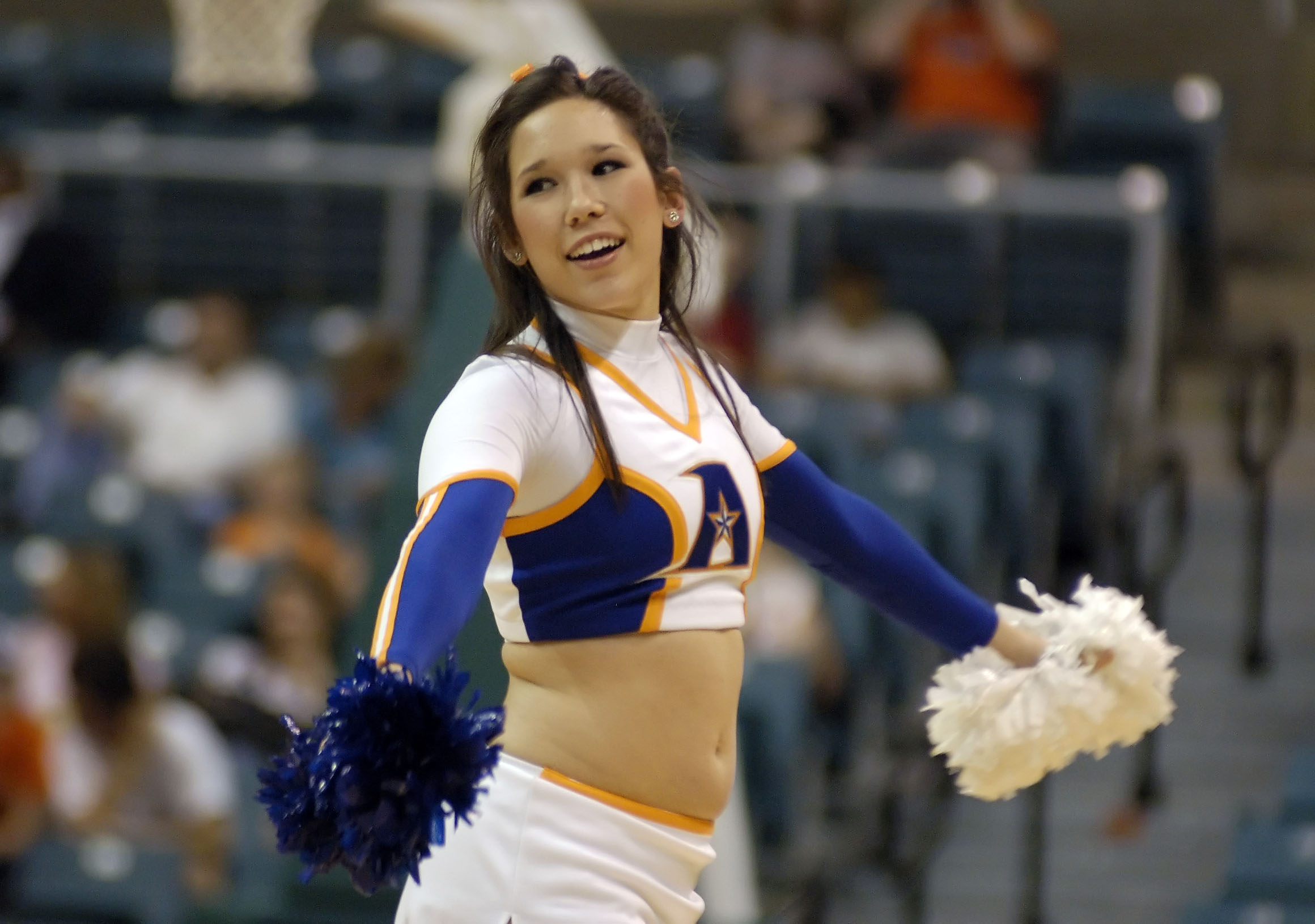 Mar 14, 2008; Katy, TX, USA; UT Arlington Mavericks cheerleader cheers on her team against the Sam Houston Bearkats in the second half of the Southland Conference Tournament at the Merrell Center. Mandatory Credit: Brett Davis-Imagn Images