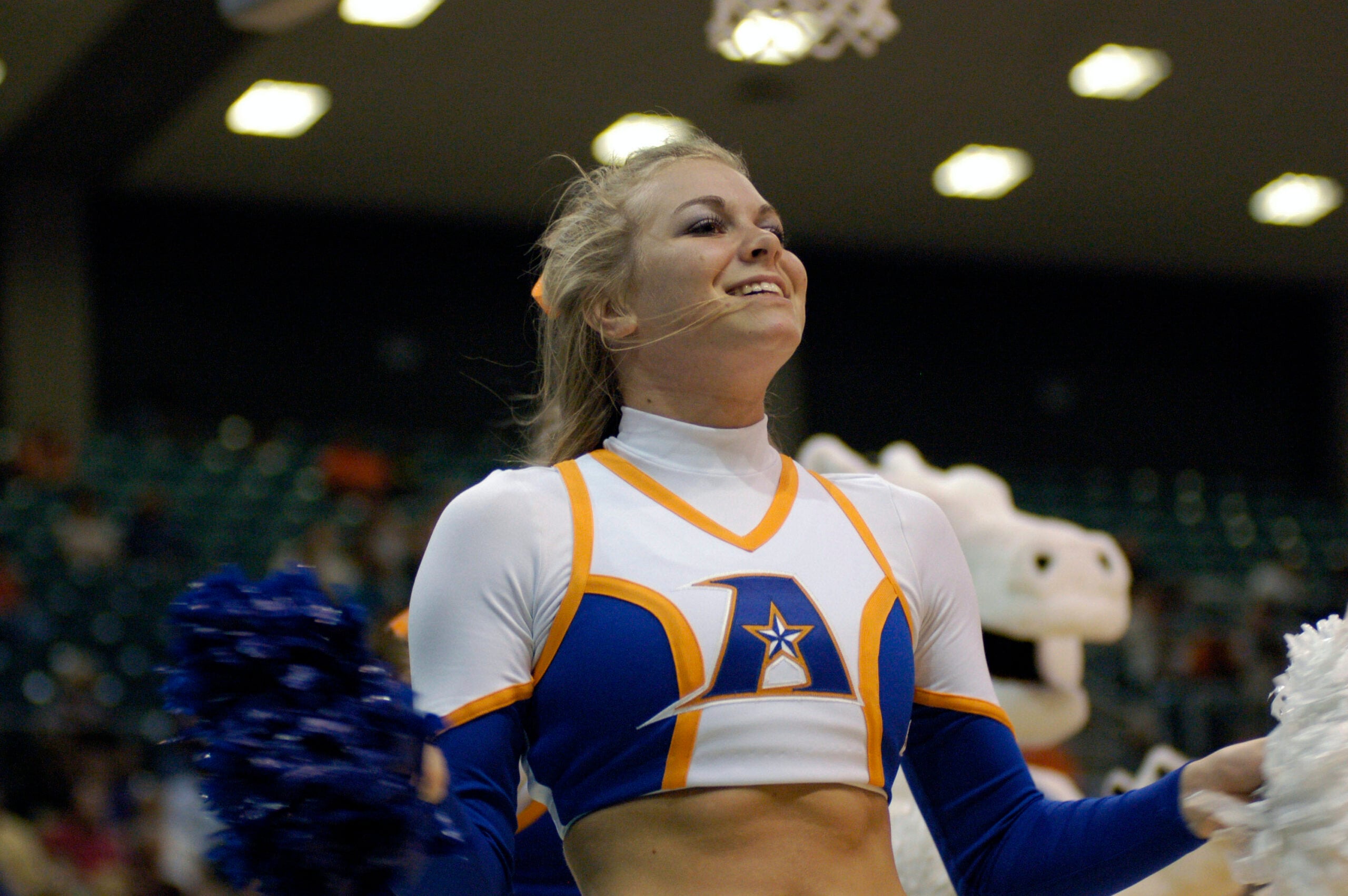 Mar 14, 2008; Katy, TX, USA; UT Arlington Mavericks cheerleader cheers on her team against the Sam Houston Bearkats in the second half of the Southland Conference Tournament at the Merrell Center. Mandatory Credit: Brett Davis-Imagn Images