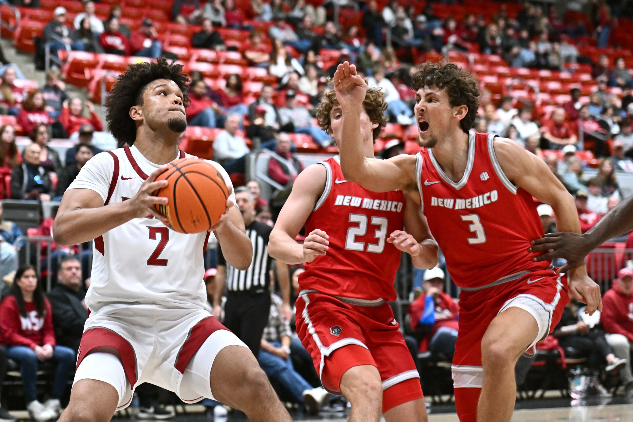 Oct 25, 2025; Pullman, WA, USA; Washington State Cougars forward Eemeli Yalaho (2) shoots the ball against New Mexico Lobos guard Jake Hall (23) in the second half at Friel Court at Beasley Coliseum. Mandatory Credit: James Snook-Imagn Images