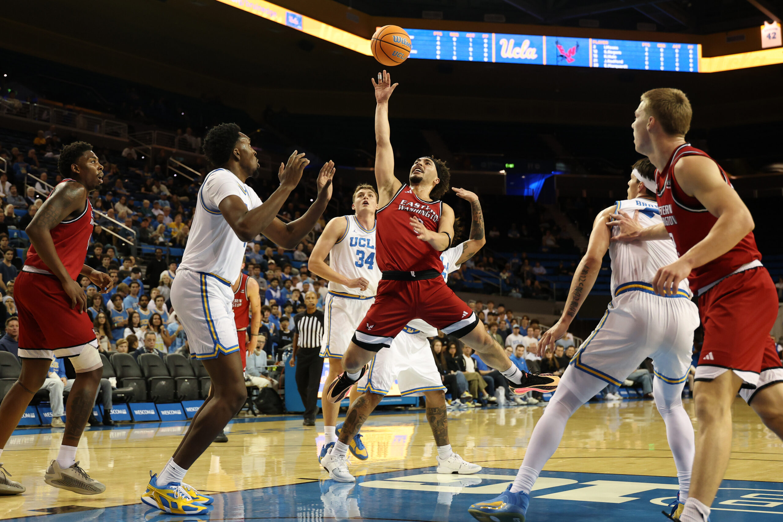 Nov 3, 2025; Los Angeles, California, USA;  Eastern Washington Eagles guard Isaiah Moses (2) shoots the ball during the first half against the UCLA Bruins at Pauley Pavilion presented by Wescom Financial. Mandatory Credit: Kiyoshi Mio-Imagn Images