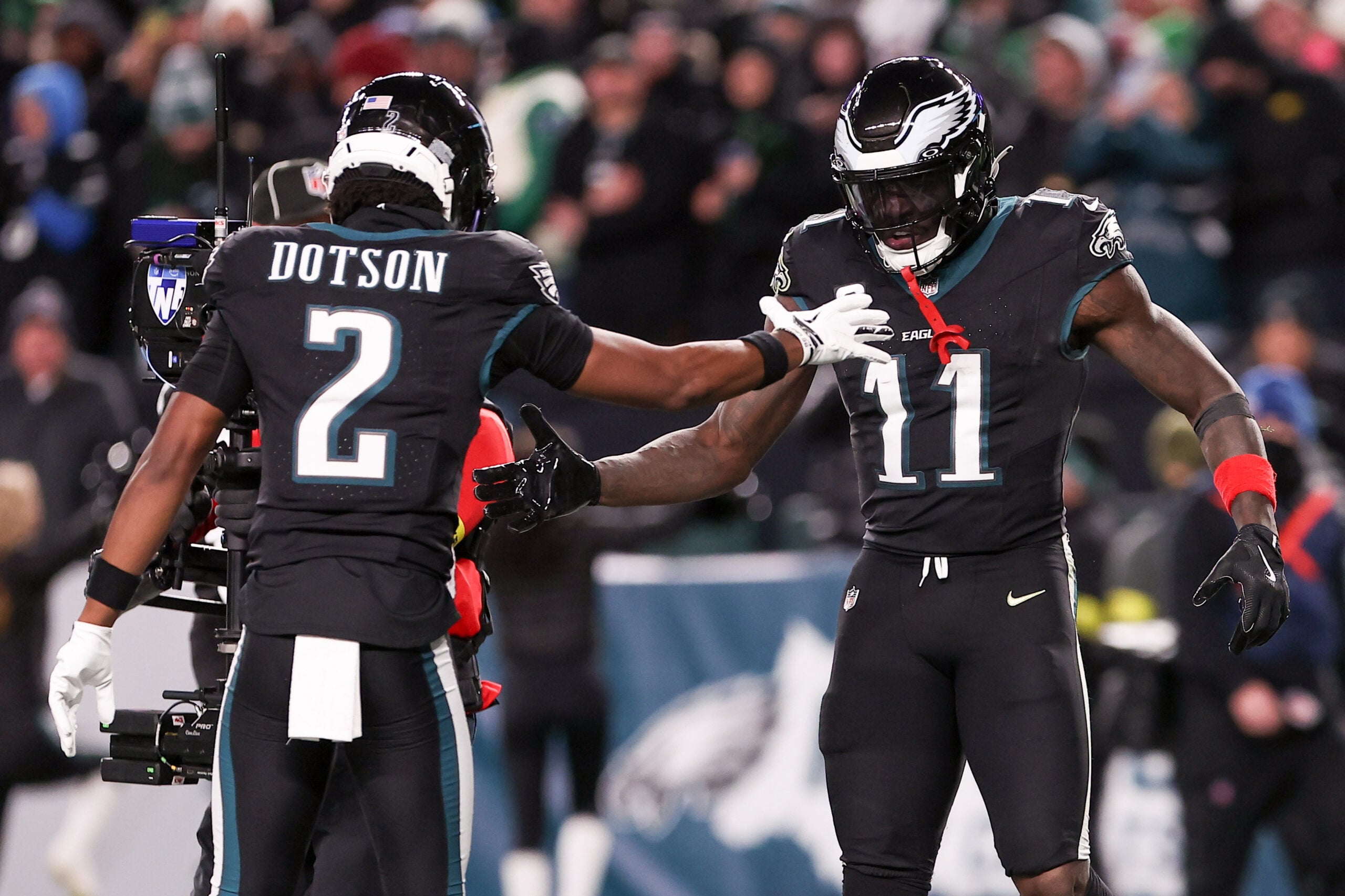 Nov 28, 2025; Philadelphia, Pennsylvania, USA; Philadelphia Eagles wide receiver A.J. Brown (11) celebrates a touchdown against the Chicago Bears with wide receiver Jahan Dotson (2) during the third quarter of the game at Lincoln Financial Field. Mandatory Credit: Bill Streicher-Imagn Images