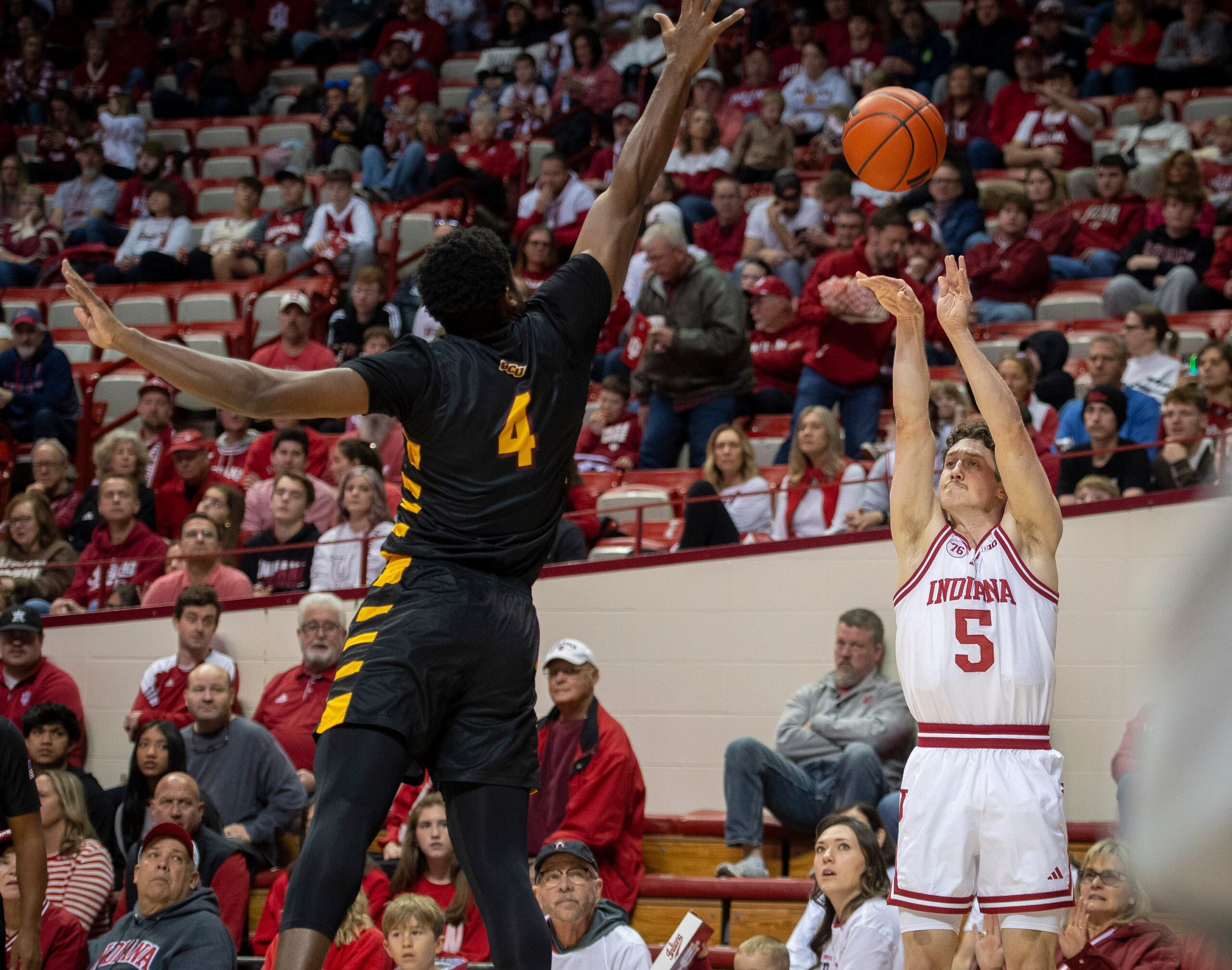 Indiana's Conor Enright (5) shoots a three-pointer during the Indiana versus Bethune-Cookman men's basketball game at Simon Skjodt Assembly Hall on Saturday, Nov. 29, 2025.