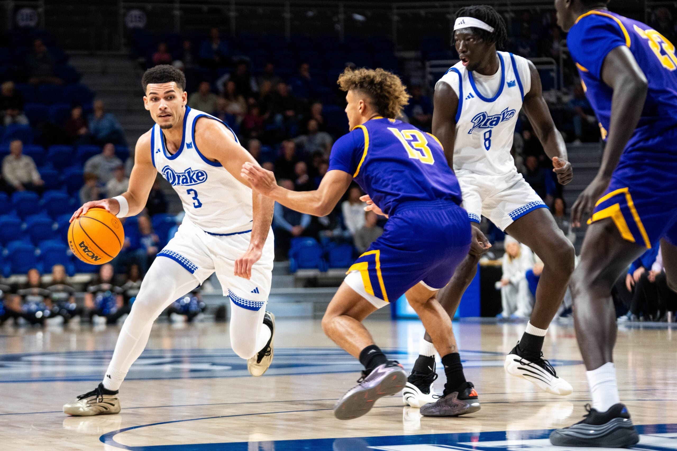 Drake’s Jalen Quinn (3) drives into the paint against Western Illinois on Dec. 2, 2025, at the Knapp Center in Des Moines.