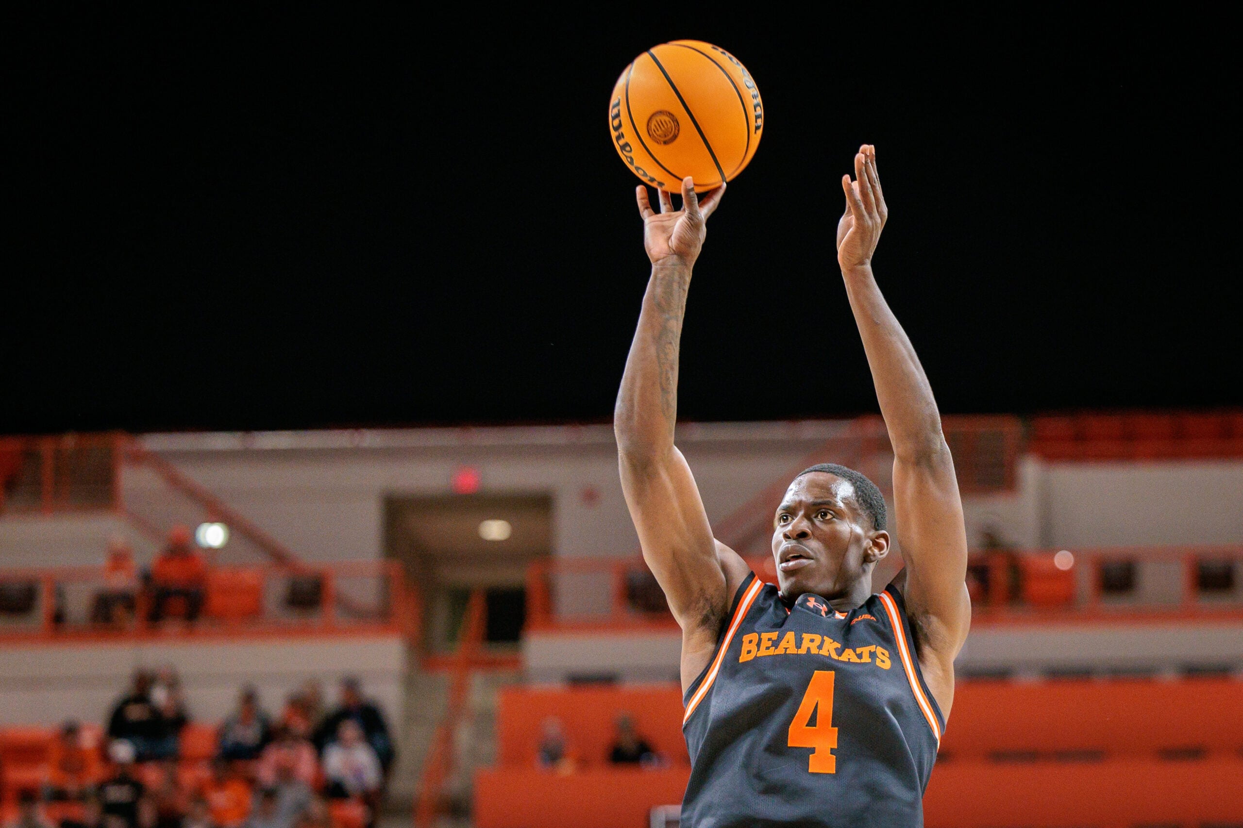 Dec 2, 2025; Stillwater, Oklahoma, USA; Sam Houston Bearkats guard Kashie Natt (4) shoots the ball during the second half against the Oklahoma State Cowboys at Gallagher-Iba Arena. Mandatory Credit: William Purnell-Imagn Images