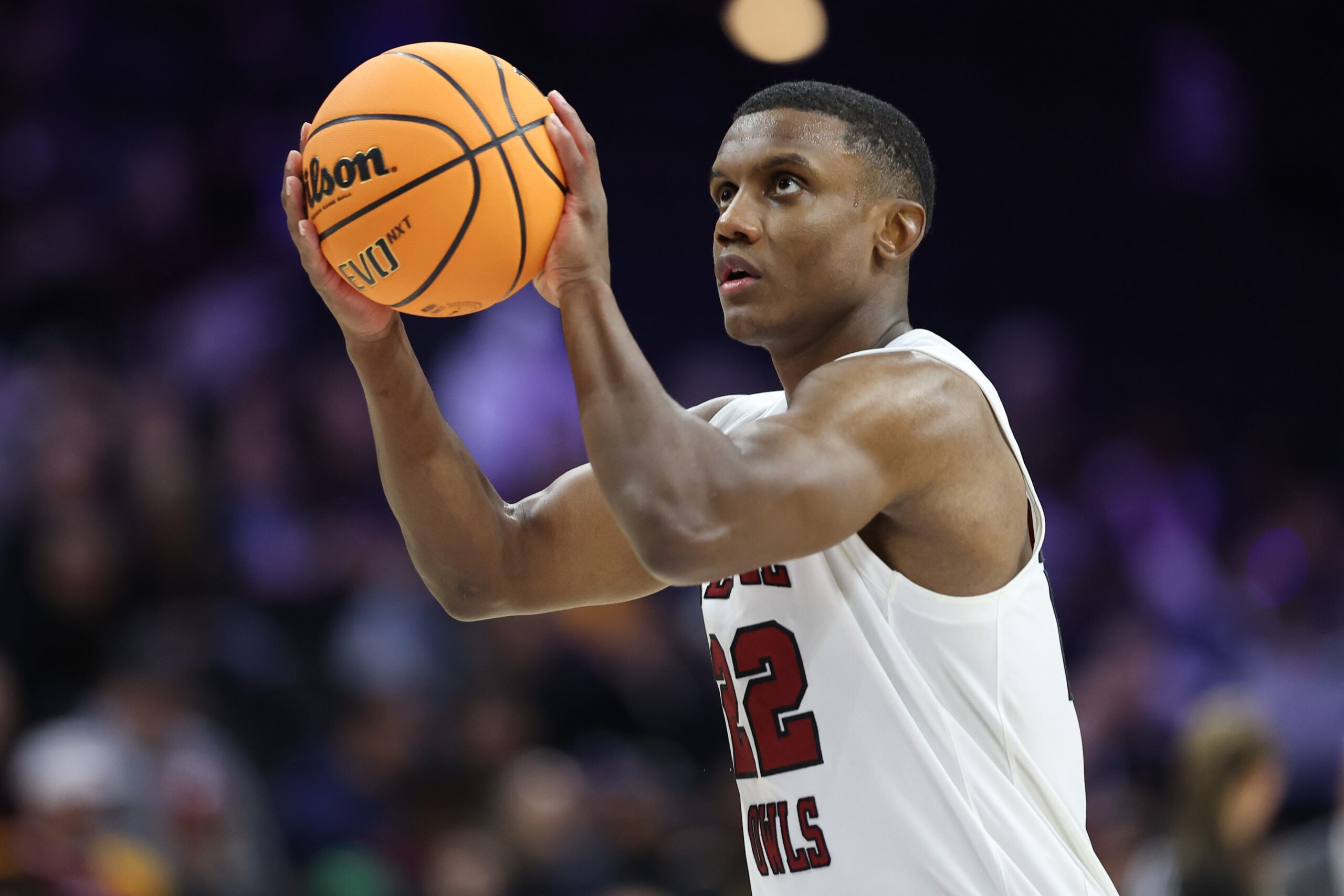 Dec 6, 2025; Philadelphia, PA, USA; Temple Owls guard Derrian Ford (22) shoots against the Saint Joseph's Hawks during the second half at Xfinity Mobile Arena. Mandatory Credit: Bill Streicher-Imagn Images