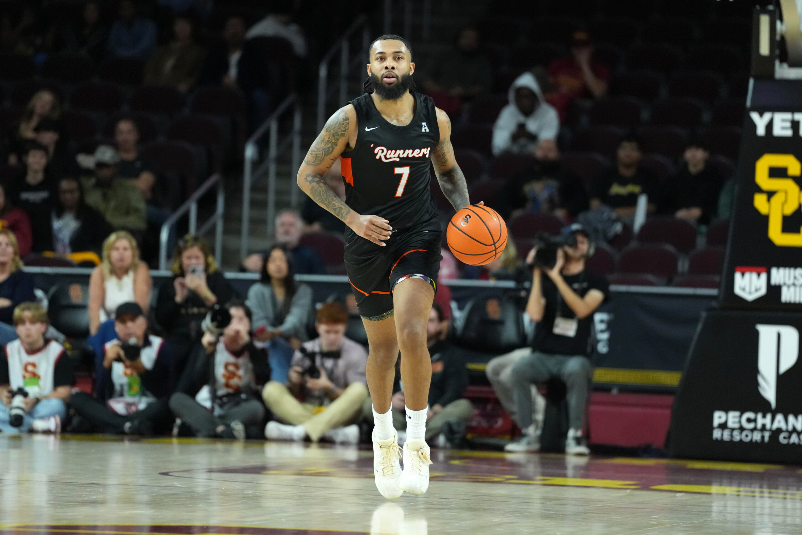 Dec 17, 2025; Los Angeles, California, USA; UTSA Roadrunners guard Jamir Simpson (7) dribbles the ball against the Southern California Trojans in the second half at Galen Center. Mandatory Credit: Kirby Lee-Imagn Images